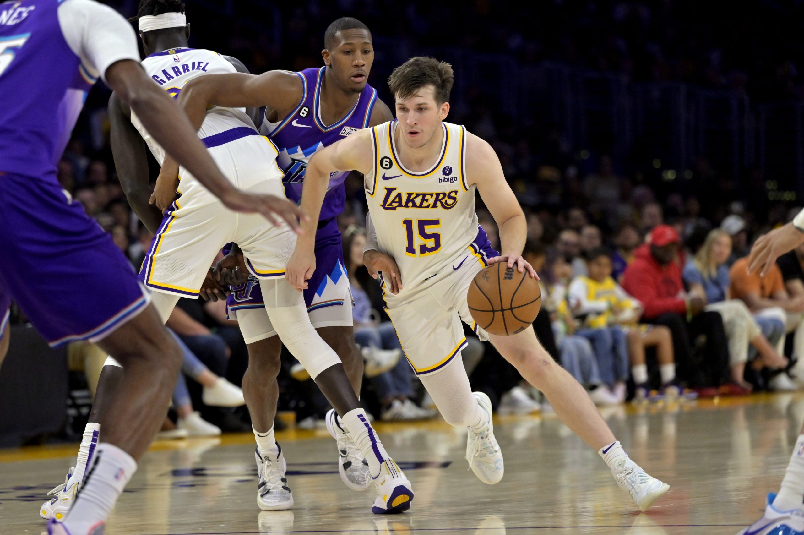 Apr 9, 2023; Los Angeles, California, USA; Los Angeles Lakers guard Austin Reaves (15) drives to the basket in the first half against the Utah Jazz at Crypto.com Arena. Mandatory Credit: Jayne Kamin-Oncea-USA TODAY Sports