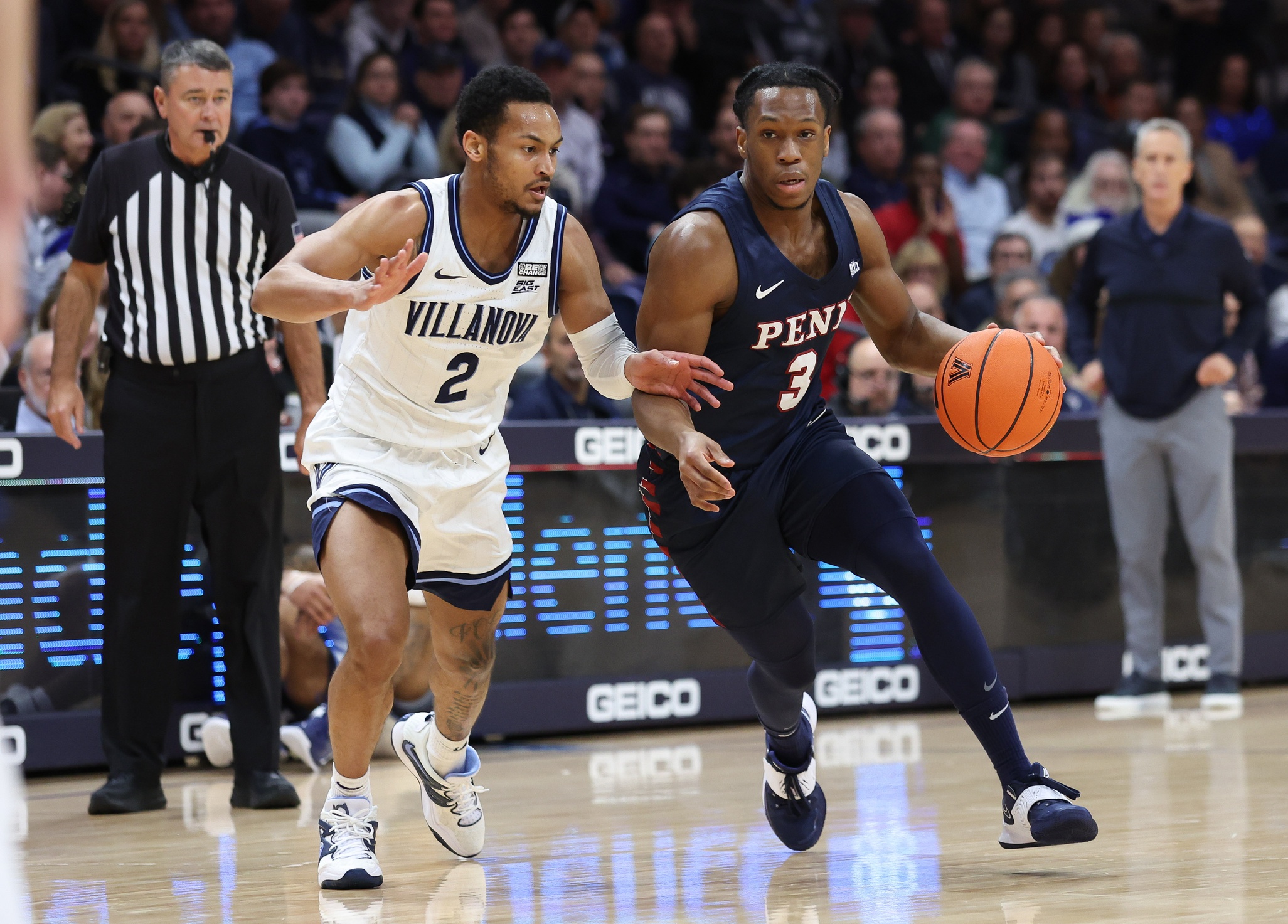 Dec 7, 2022; Villanova, Pennsylvania, USA; Pennsylvania Quakers guard an St. John's transfer Jordan Dingle (3) dribbles against Villanova Wildcats guard Mark Armstrong (2) during the first half at William B. Finneran Pavilion. Mandatory Credit: Bill Streicher-USA TODAY Sports