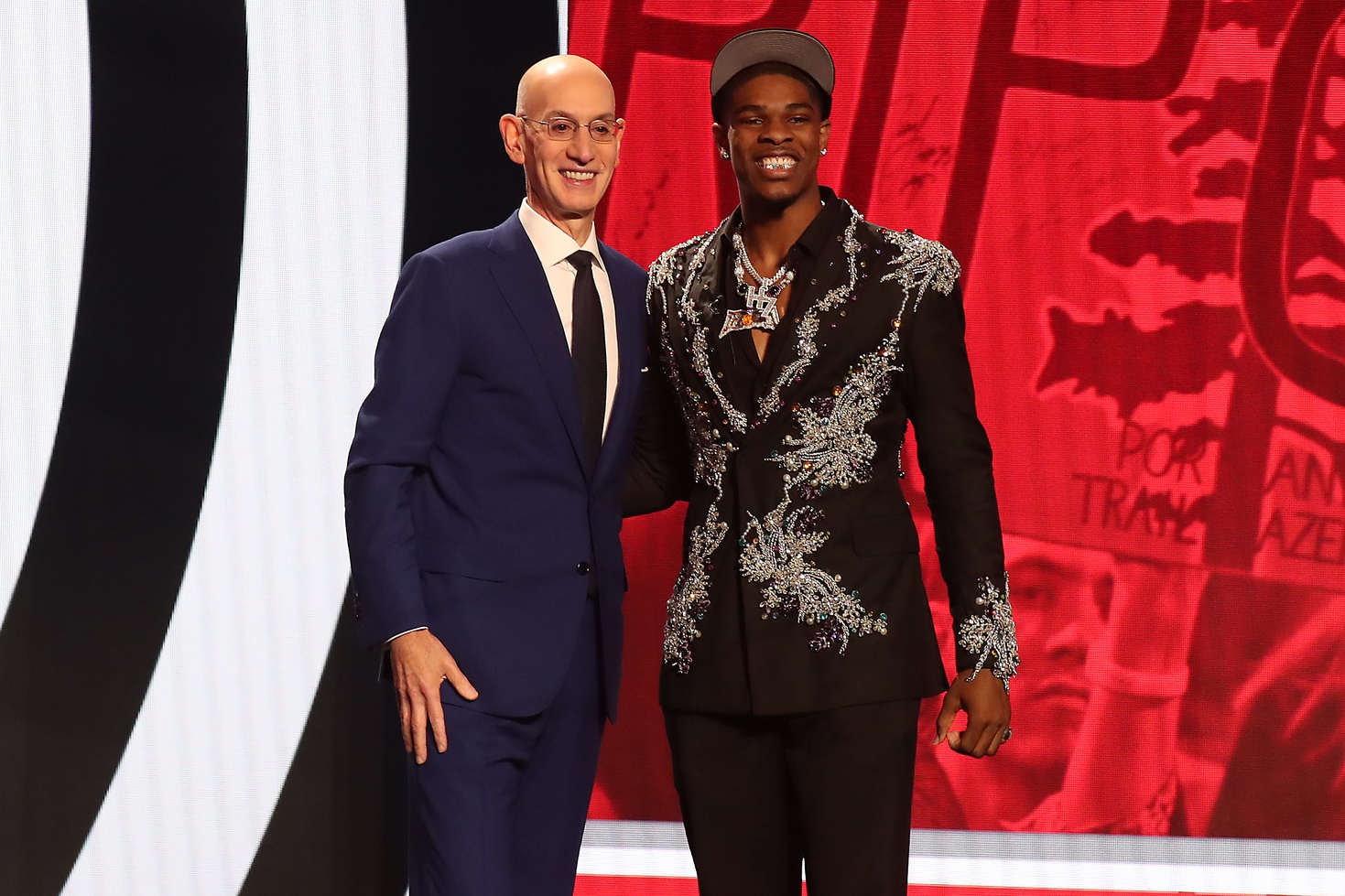 Jun 22, 2023; Brooklyn, NY, USA; Scoot Henderson with NBA commissioner Adam Silver after being selected third by the Portland Trail Blazers in the first round of the 2023 NBA Draft at Barclays Arena. Mandatory Credit: Wendell Cruz-USA TODAY Sports