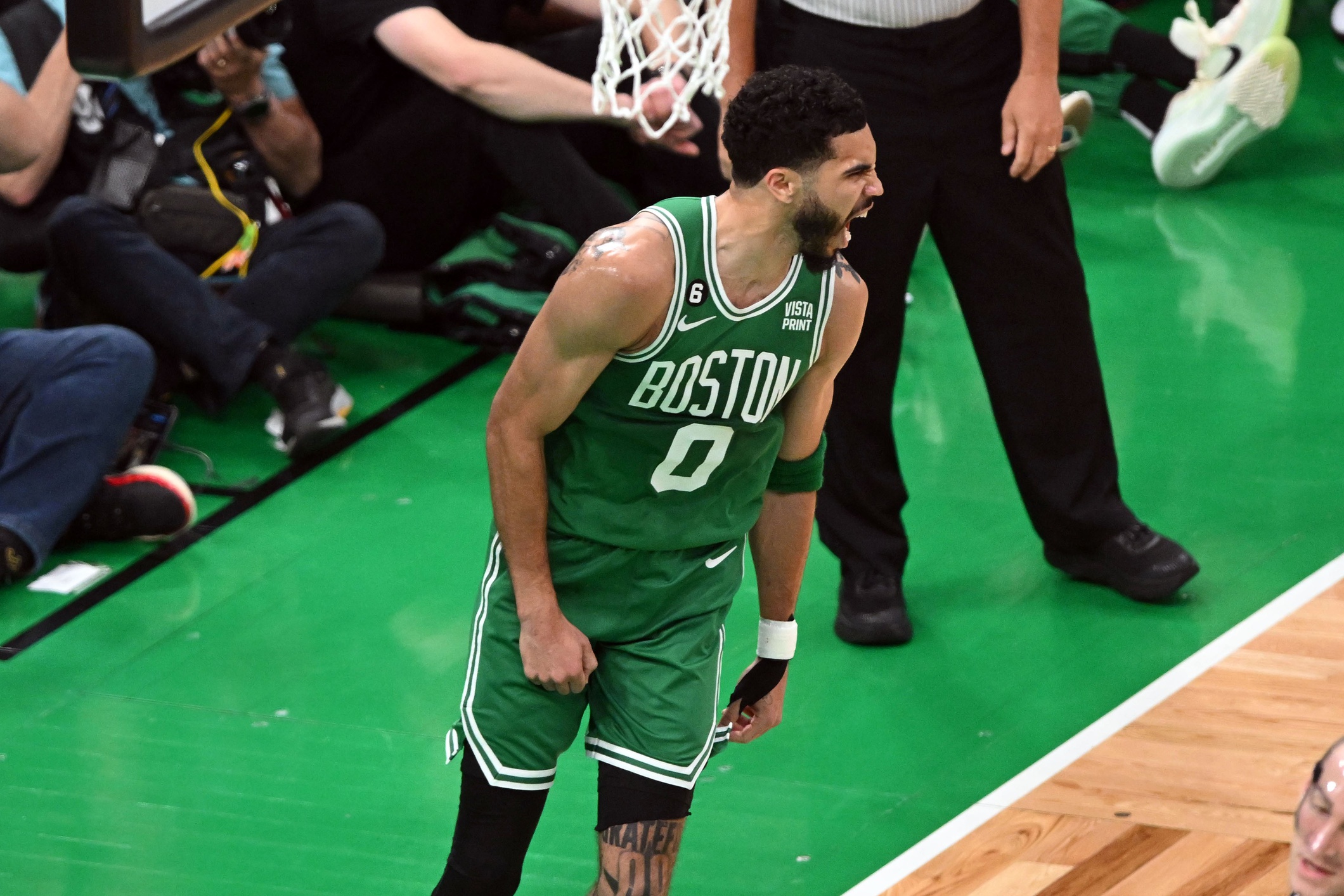 May 25, 2023; Boston, Massachusetts, USA; Boston Celtics forward Jayson Tatum (0) reacts after a shot against the Miami Heat in the first quarter during game five of the Eastern Conference Finals for the 2023 NBA playoffs at TD Garden. Mandatory Credit: Brian Fluharty-USA TODAY Sports