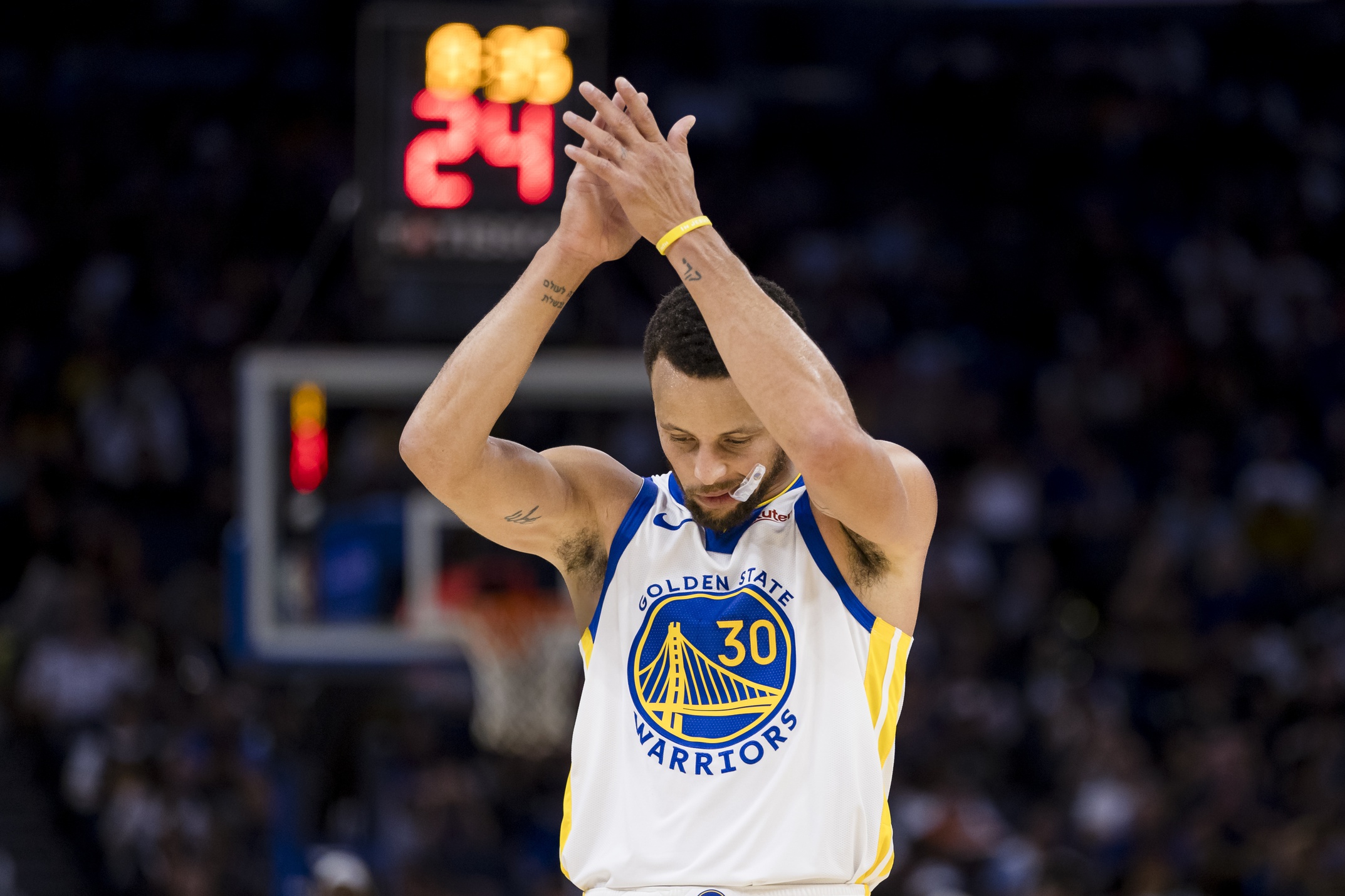 Oct 7, 2023; San Francisco, California, USA; Golden State Warriors guard Stephen Curry (30) reacts after a teammate scores on a free-throw against the Los Angeles Lakers during the first half at Chase Center. Mandatory Credit: John Hefti-USA TODAY Sports