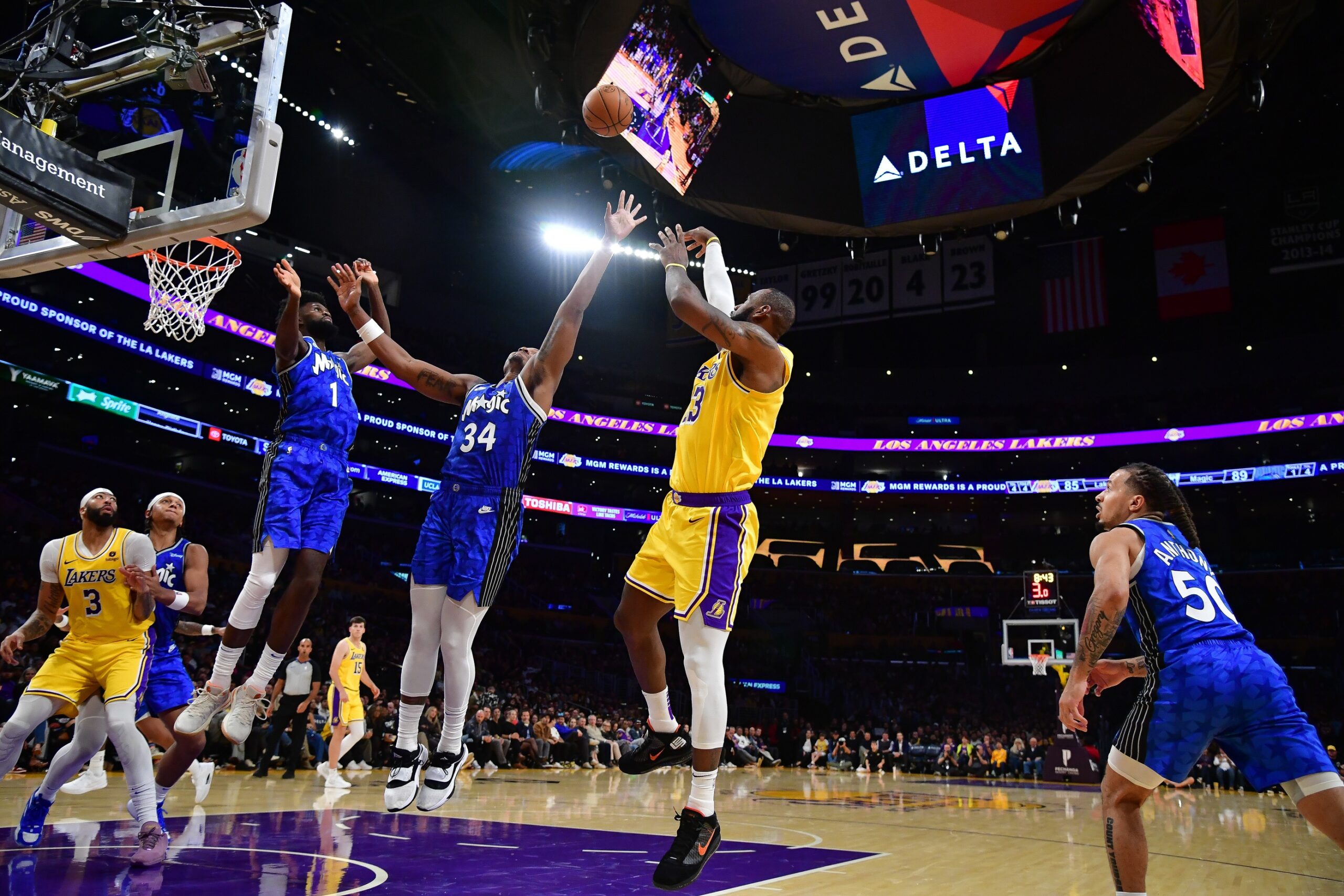 Oct 30, 2023; Los Angeles, California, USA; Los Angeles Lakers forward LeBron James (23) shoots against Orlando Magic center Wendell Carter Jr. (34) during the second half at Crypto.com Arena. Mandatory Credit: Gary A. Vasquez-USA TODAY Sports