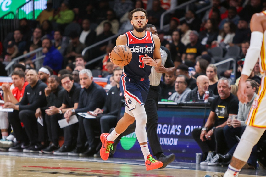 Nov 1, 2023; Atlanta, Georgia, USA; Washington Wizards guard Tyus Jones (5) dribbles against the Atlanta Hawks in the second half at State Farm Arena. Mandatory Credit: Brett Davis-USA TODAY Sports