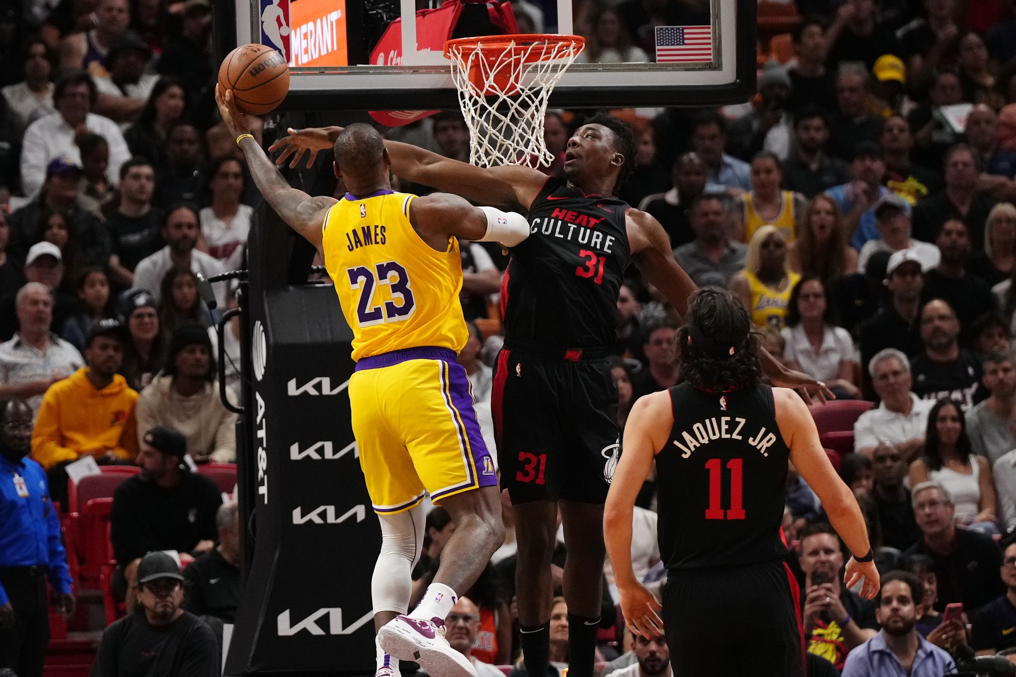 Nov 6, 2023; Miami, Florida, USA; Los Angeles Lakers forward LeBron James (23) shoots the ball around Miami Heat center Thomas Bryant (31) during the first half at Kaseya Center. Mandatory Credit: Jasen Vinlove-USA TODAY Sports