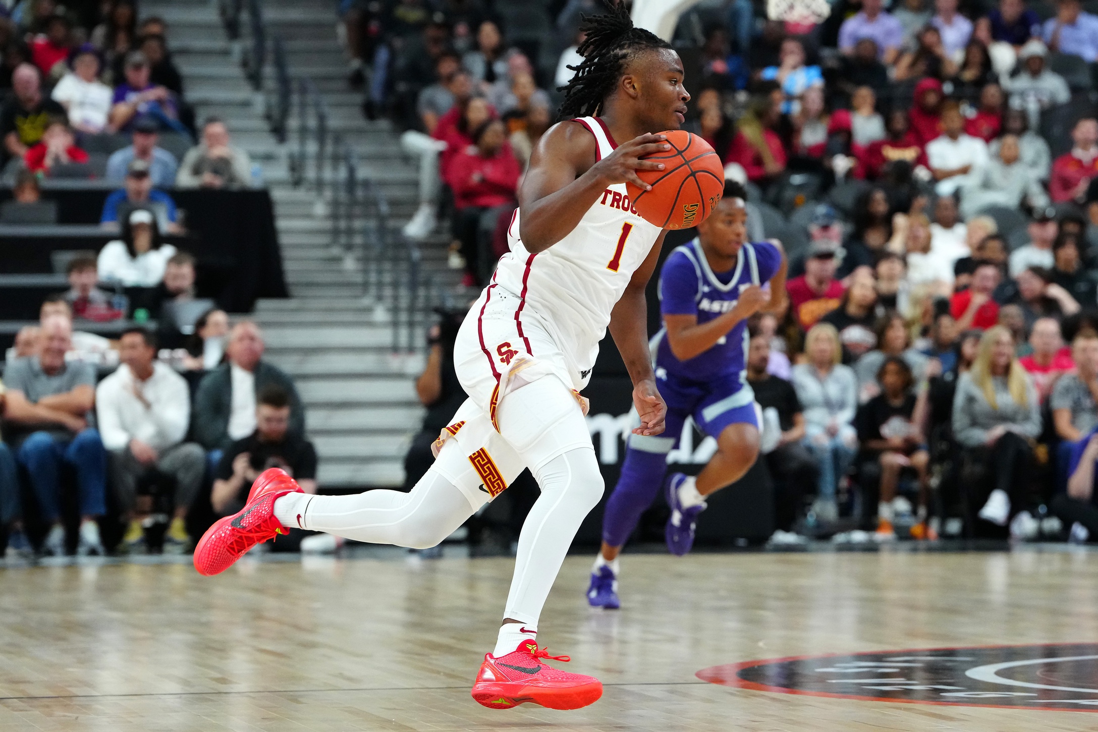 USC Trojans guard Isaiah Collier (1) dribbles against the Kansas State Wildcats during the first half at T-Mobile Arena.