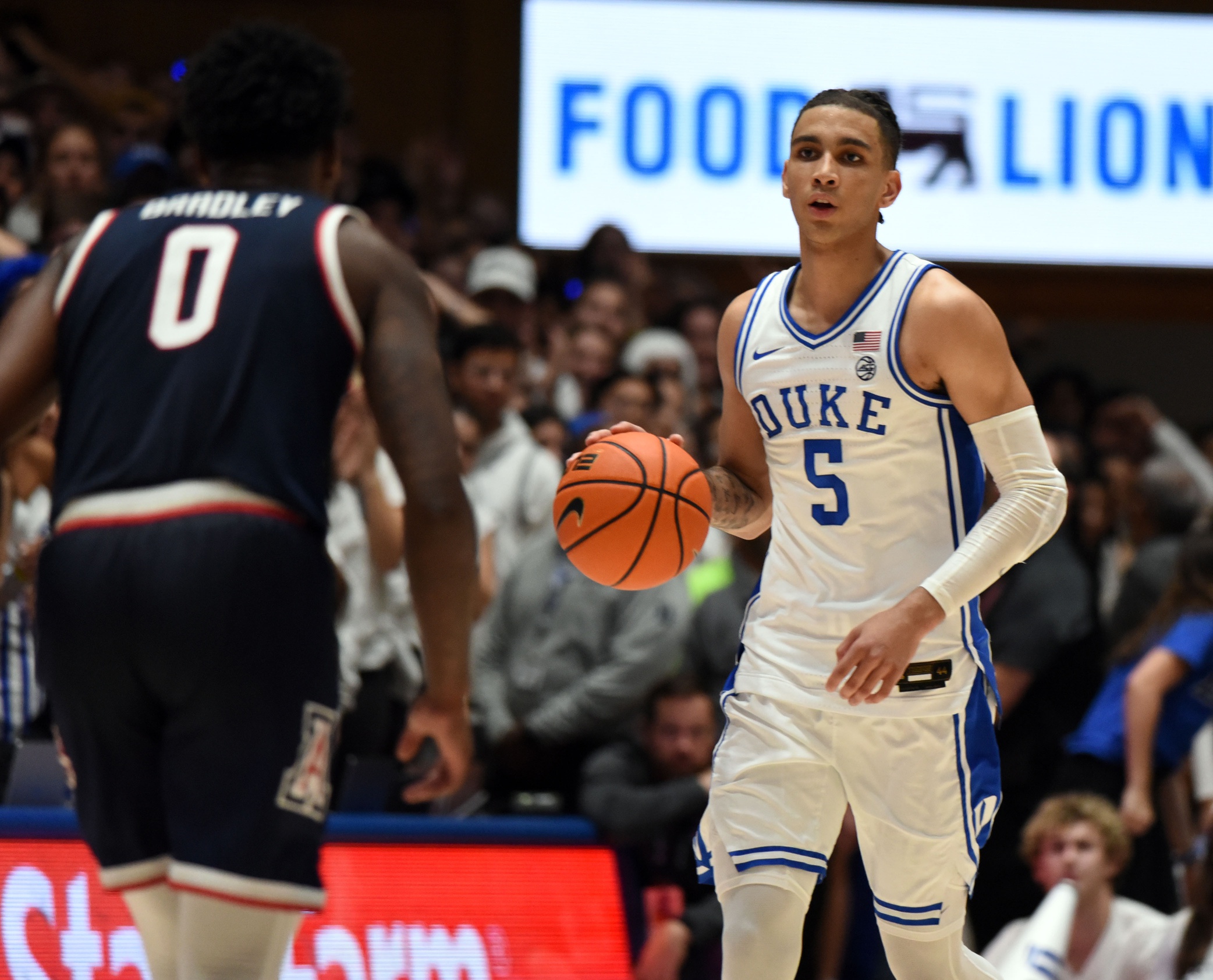 Duke Blue Devils guard Tyrese Proctor(5) dribbles up court during the second half against the Arizona Wildcats at Cameron Indoor Stadium.