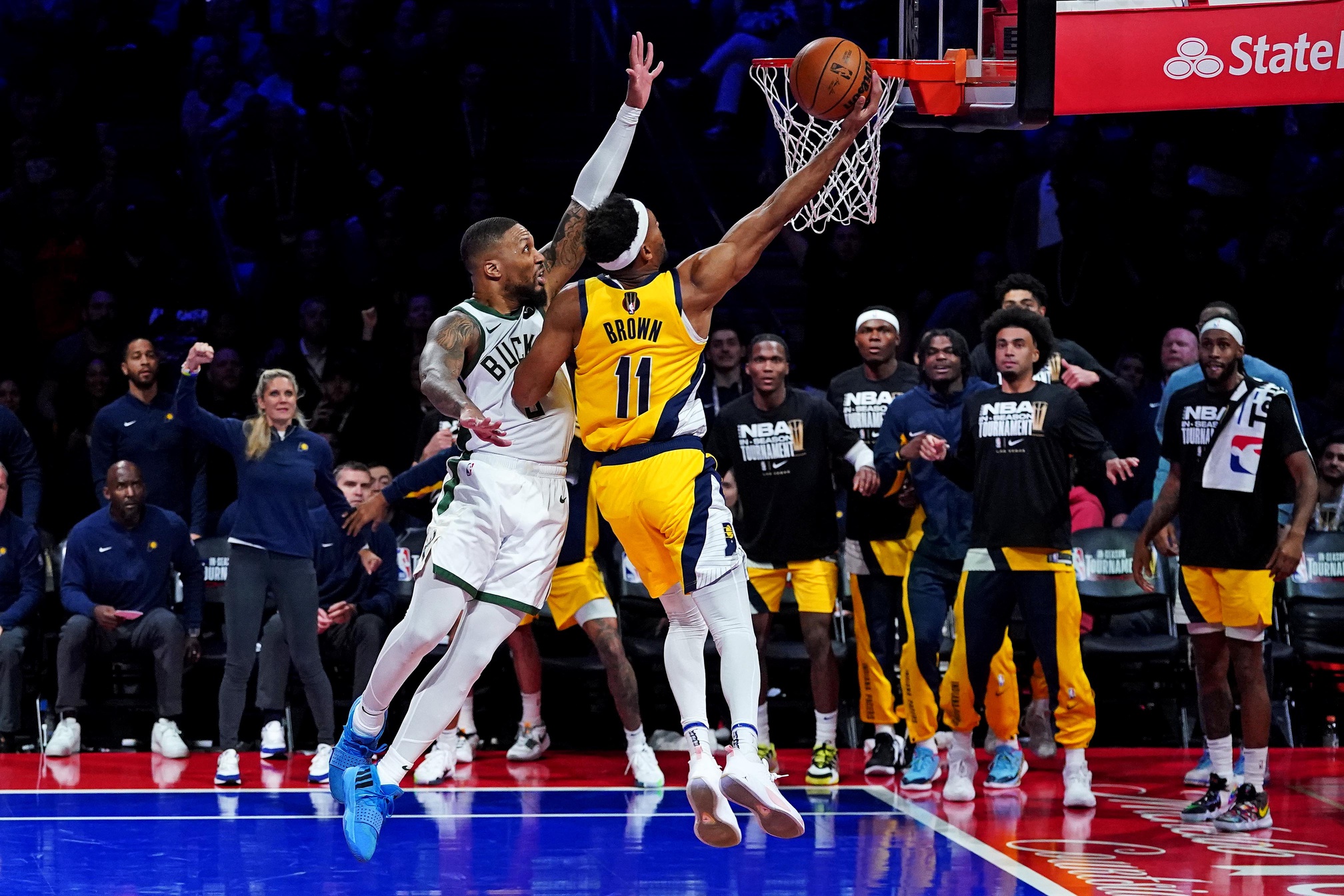 Dec 7, 2023; Las Vegas, Nevada, USA; Indiana Pacers forward Bruce Brown (11) shoots the ball against Milwaukee Bucks guard Damian Lillard (0) in the NBA In Season Tournament Semifinal at T-Mobile Arena. Mandatory Credit: Kyle Terada-USA TODAY Sports