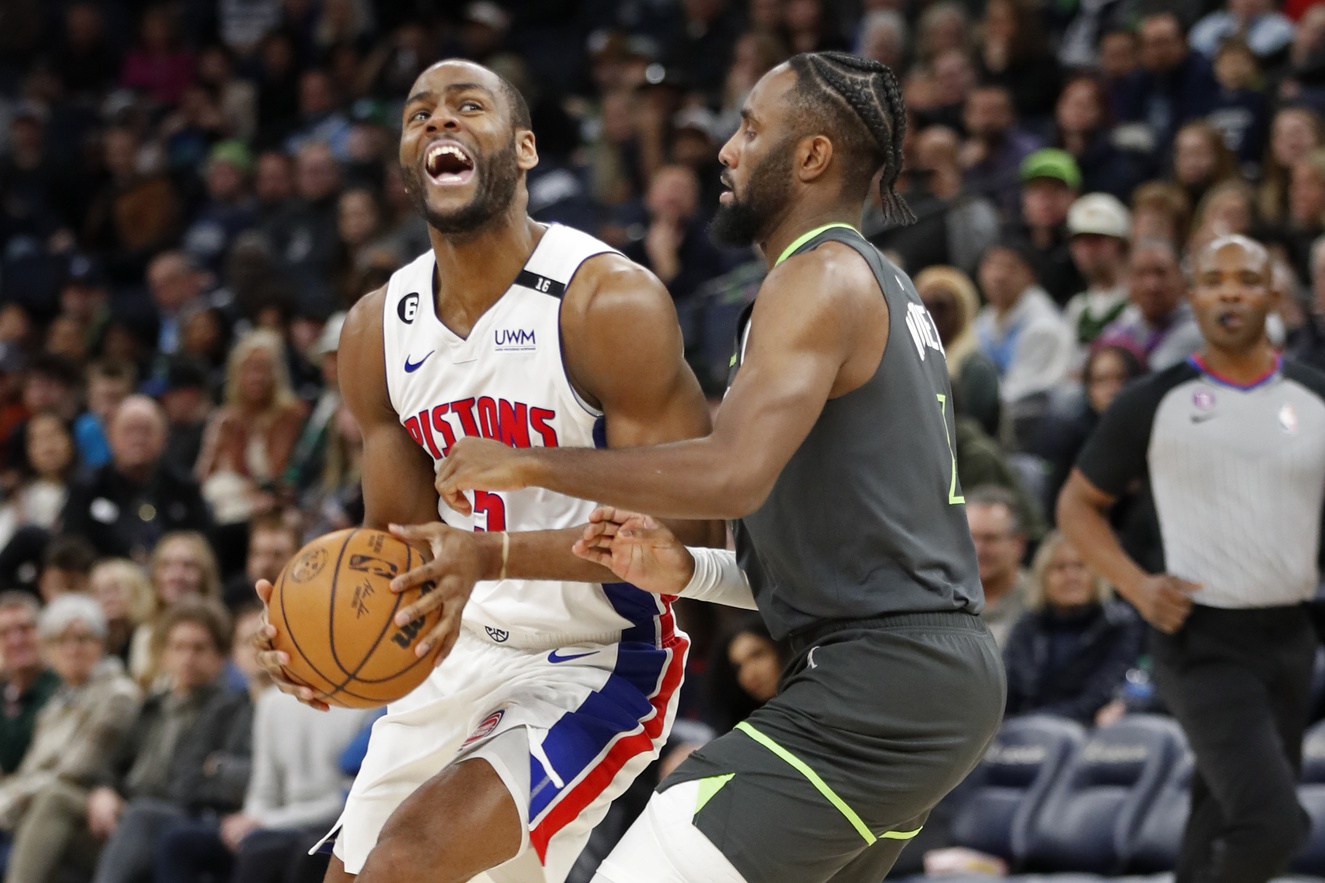 Dec 31, 2022; Minneapolis, Minnesota, USA; Detroit Pistons guard Alec Burks (5) works around Minnesota Timberwolves guard Jaylen Nowell (4) in the third quarter at Target Center. Mandatory Credit: Bruce Kluckhohn-USA TODAY Sports