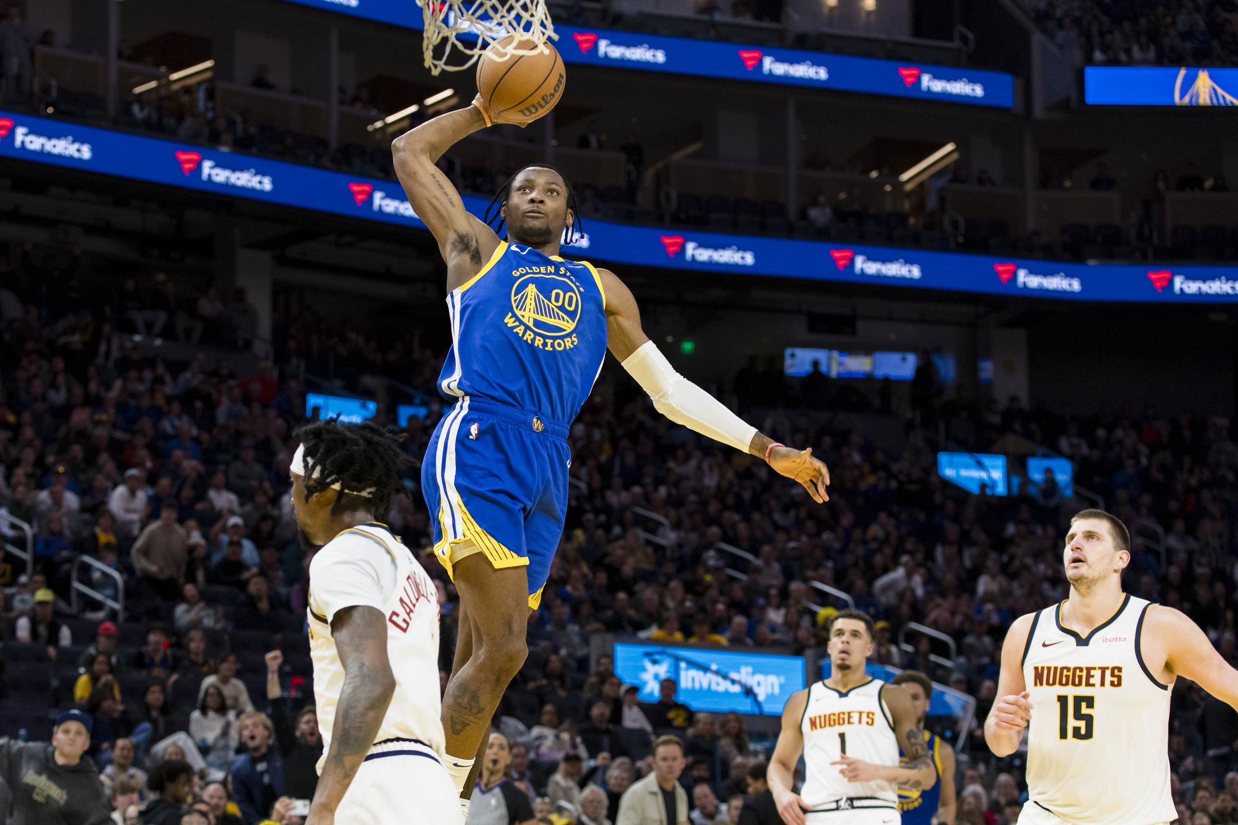 Jan 4, 2024; San Francisco, California, USA; Golden State Warriors forward Jonathan Kuminga (00) dunks against the Denver Nuggets during the second half at Chase Center. Mandatory Credit: John Hefti-USA TODAY Sports