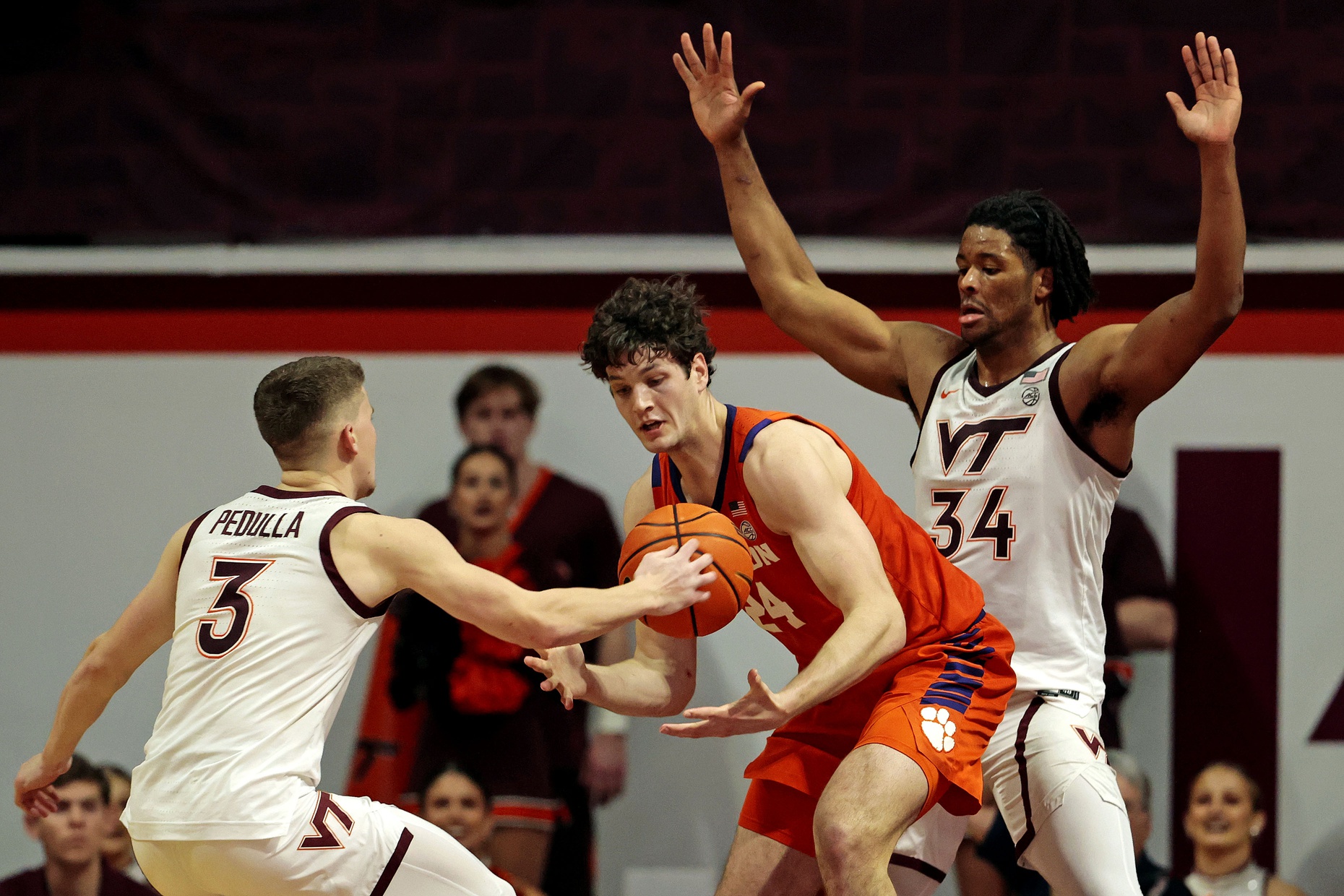 Virginia Tech Hokies guard Sean Pedulla (3) steals the ball against Clemson Tigers center PJ Hall (24) during the second half at Cassell Coliseum.