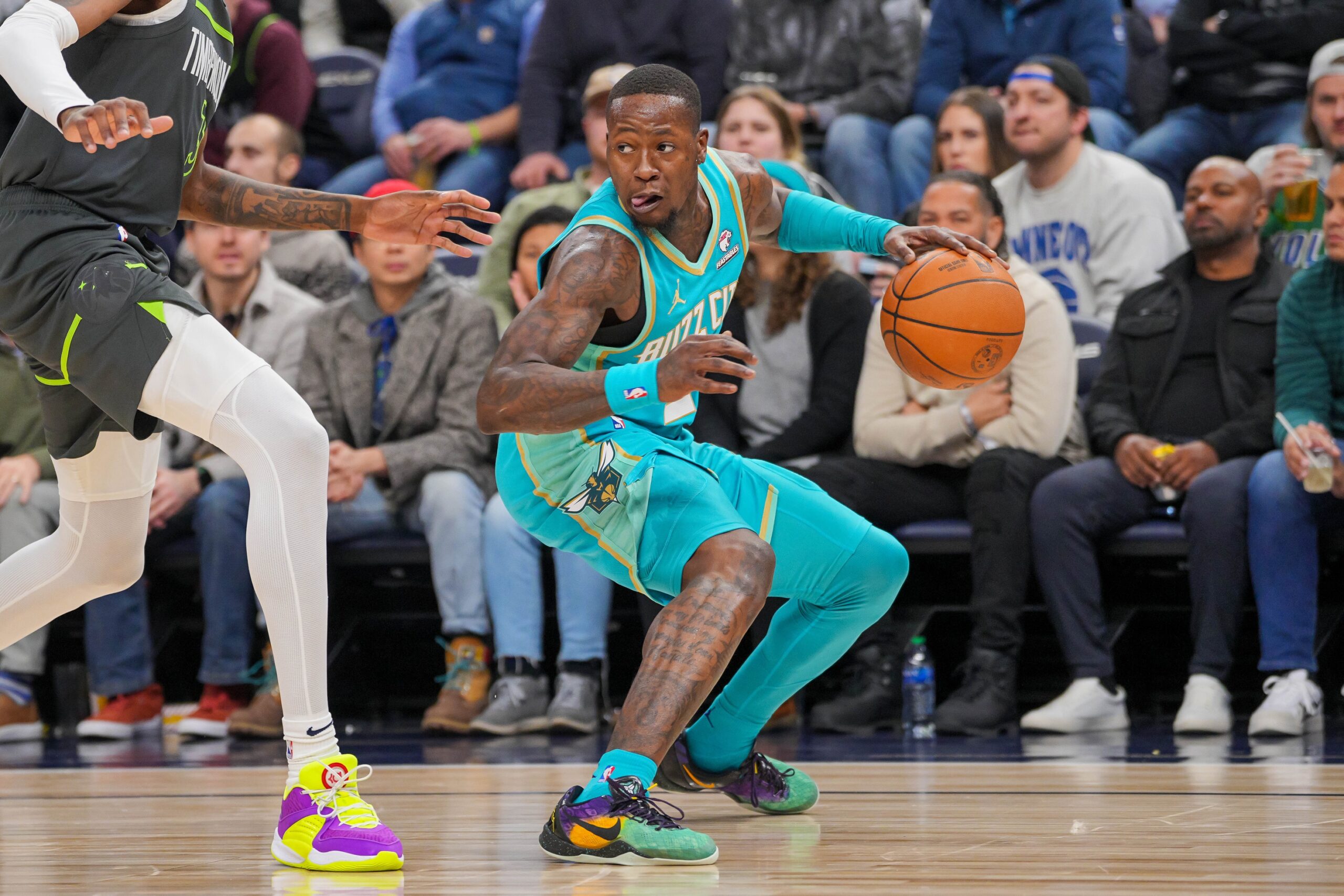 Charlotte Hornets guard Terry Rozier (3) dribbles against the Minnesota Timberwolves in the fourth quarter at Target Center.