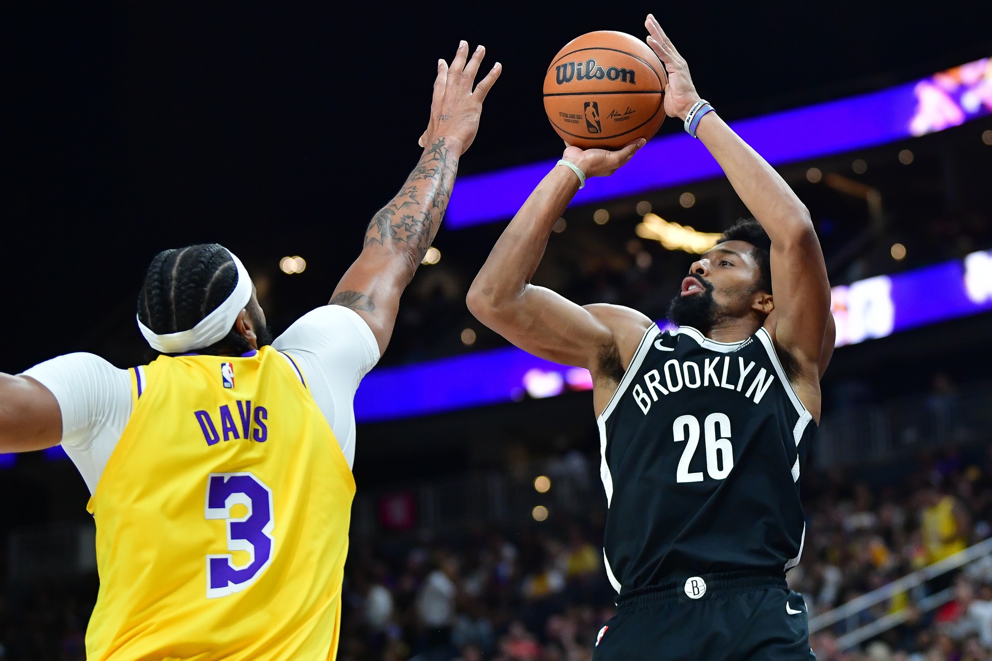 Oct 9, 2023; Las Vegas, Nevada, USA; Brooklyn Nets guard Spencer Dinwiddie (26) shoots against Los Angeles Lakers forward Anthony Davis (3) during the first half at T-Mobile Arena. Mandatory Credit: Gary A. Vasquez-USA TODAY Sports