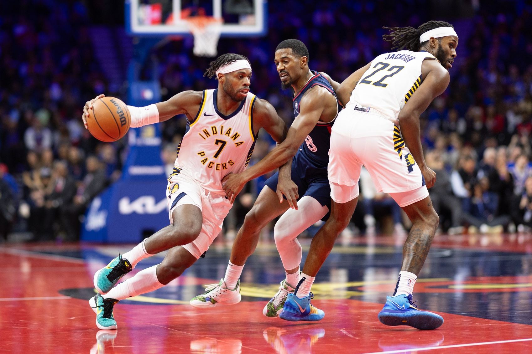 Nov 14, 2023; Philadelphia, Pennsylvania, USA; Indiana Pacers guard Buddy Hield (7) dribbles past Philadelphia 76ers guard De'Anthony Melton (8) during the third quarter at Wells Fargo Center. Mandatory Credit: Bill Streicher-USA TODAY Sports