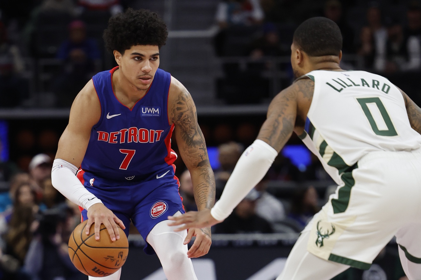 Jan 20, 2024; Detroit, Michigan, USA; Detroit Pistons guard Killian Hayes (7) dribbles while defended by Milwaukee Bucks guard Damian Lillard (0) in the first half at Little Caesars Arena. Mandatory Credit: Rick Osentoski-USA TODAY Sports