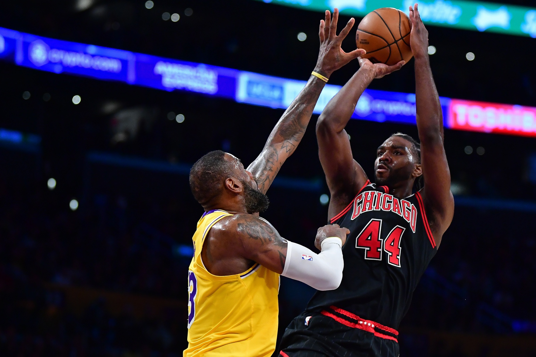 Jan 25, 2024; Los Angeles, California, USA; Chicago Bulls forward Patrick Williams (44) shoots against Los Angeles Lakers forward LeBron James (23) during the second half at Crypto.com Arena. Mandatory Credit: Gary A. Vasquez-USA TODAY Sports