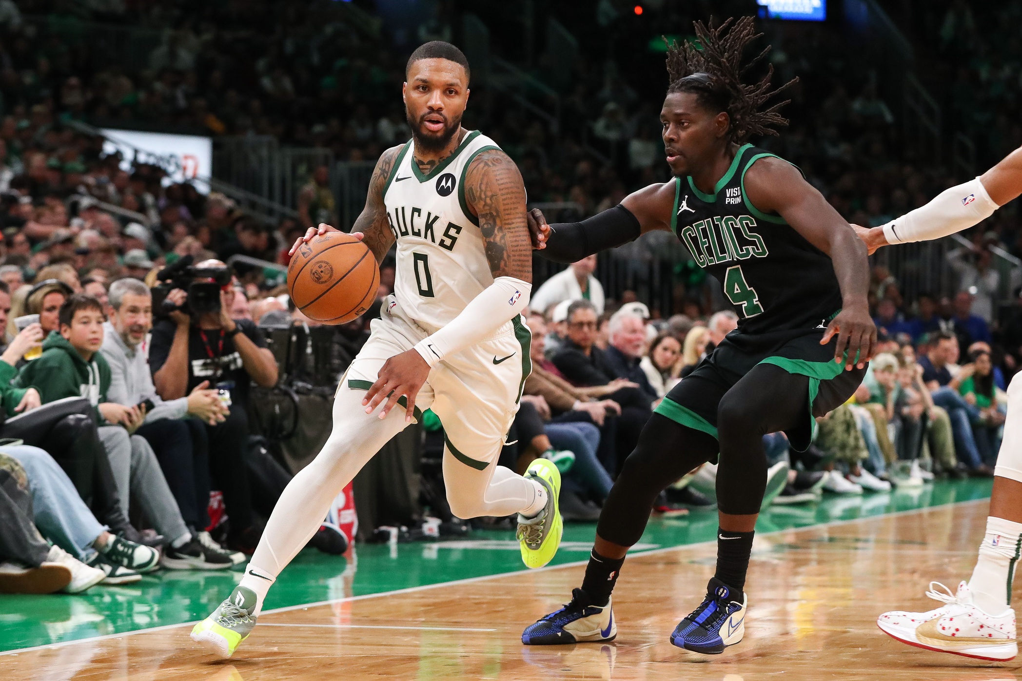 Boston Celtics guard and Jrue Holiday and Milwaukee Bucks guard Damian Lillard, who were involved in an blockbuster NBA trade