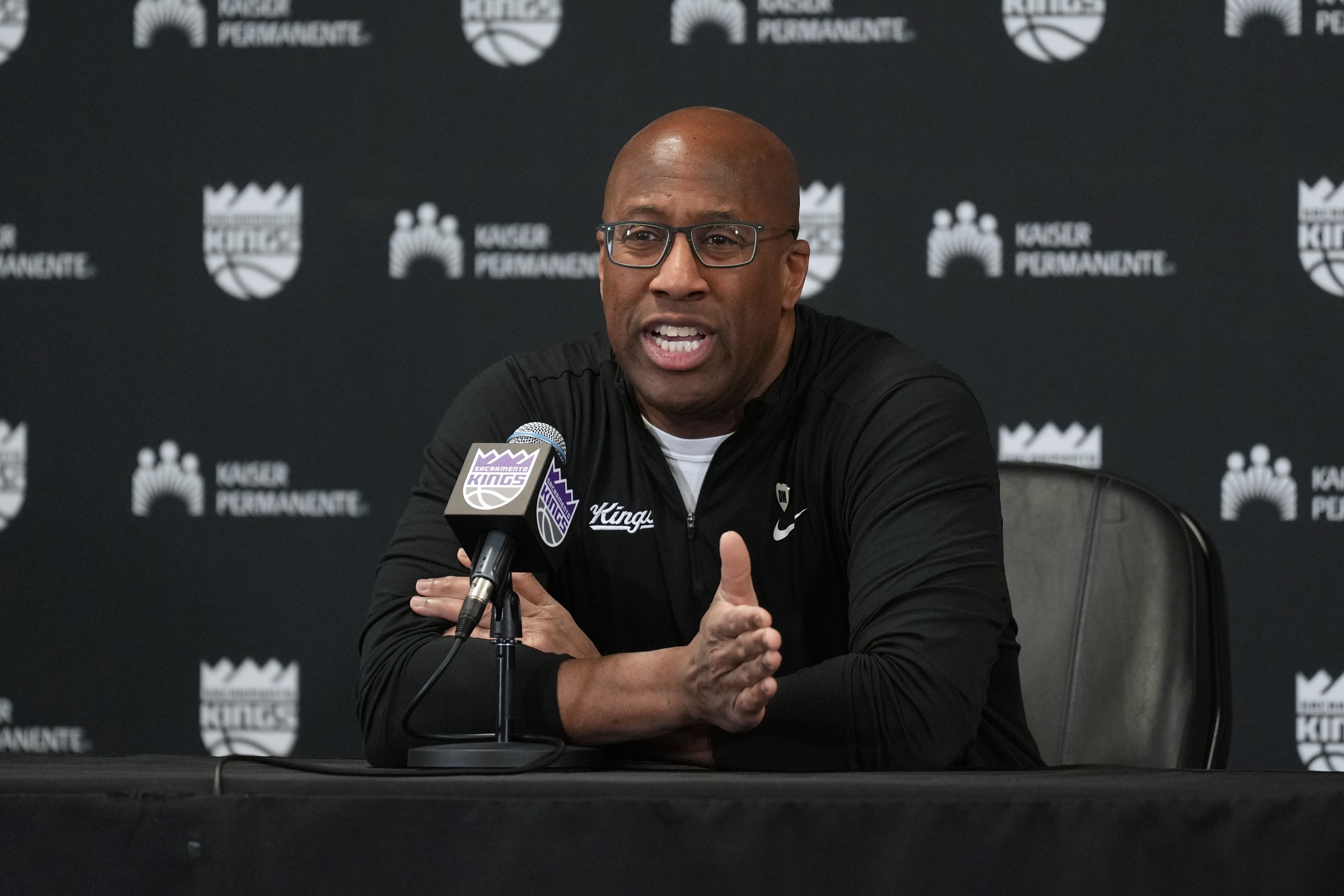 Mar 10, 2024; Sacramento, California, USA; Sacramento Kings head coach Mike Brown talks to media members before the game against the Houston Rockets at Golden 1 Center. Mandatory Credit: Darren Yamashita-USA TODAY Sports