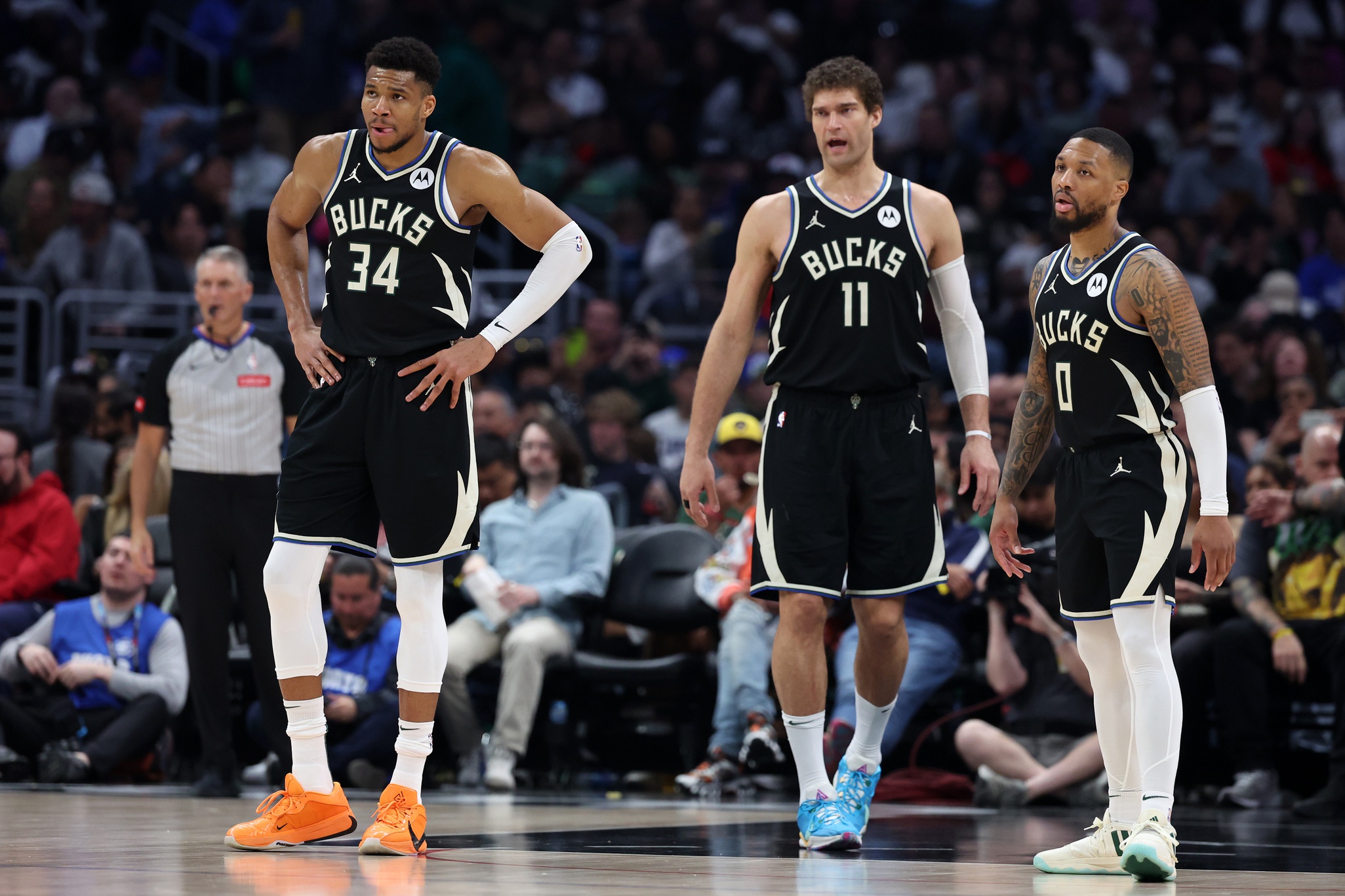 Giannis Antetokounmpo, Damian Lillard, and Brook Lopez of the Milwaukee Bucks