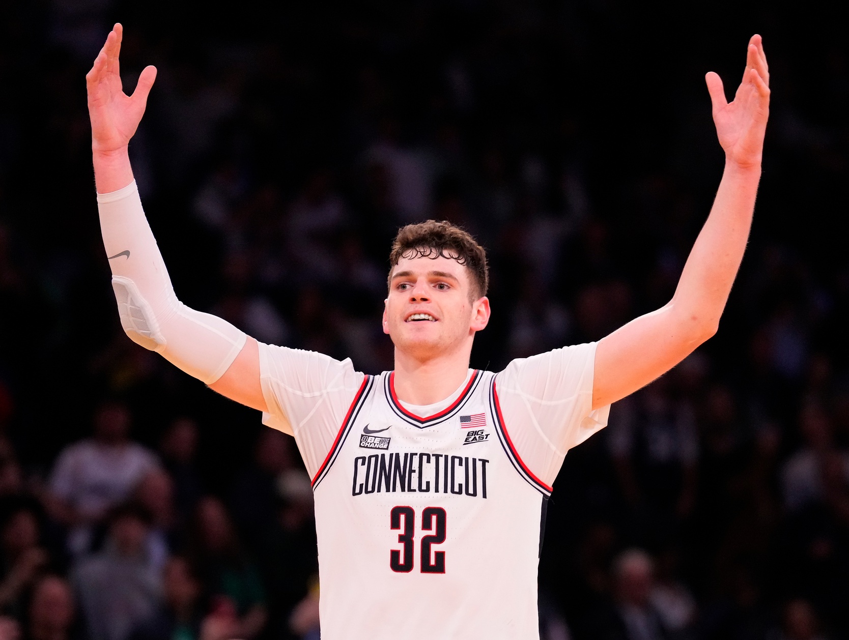 Connecticut Huskies center Donovan Clingan (32) celebrates as the clock winds down against Marquette Golden Eagles in the second half at Madison Square Garden.