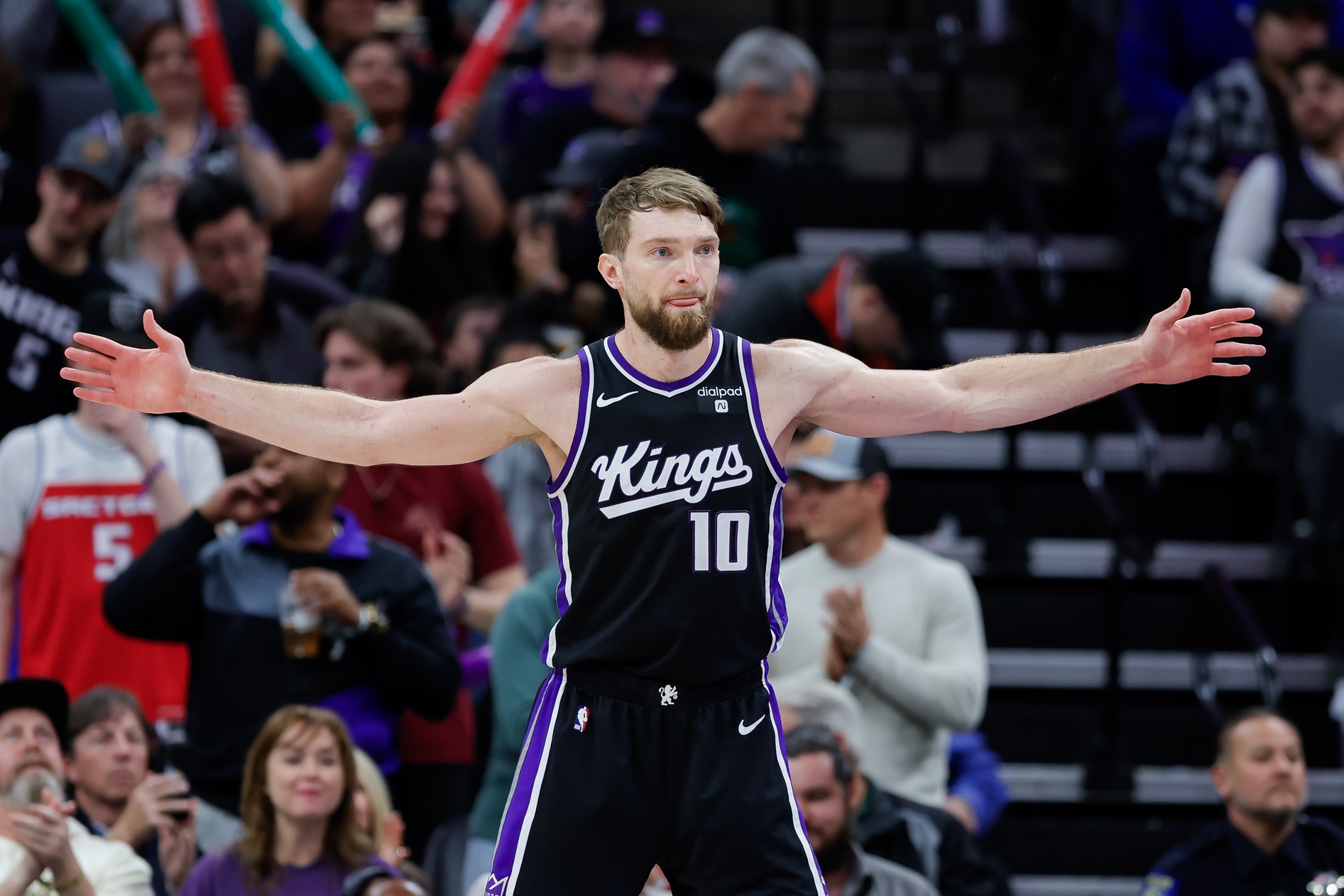 Mar 25, 2024; Sacramento, California, USA; Sacramento Kings forward Domantas Sabonis (10) sets in position during the fourth third against the Philadelphia 76ers at Golden 1 Center. Mandatory Credit: Sergio Estrada-USA TODAY Sports