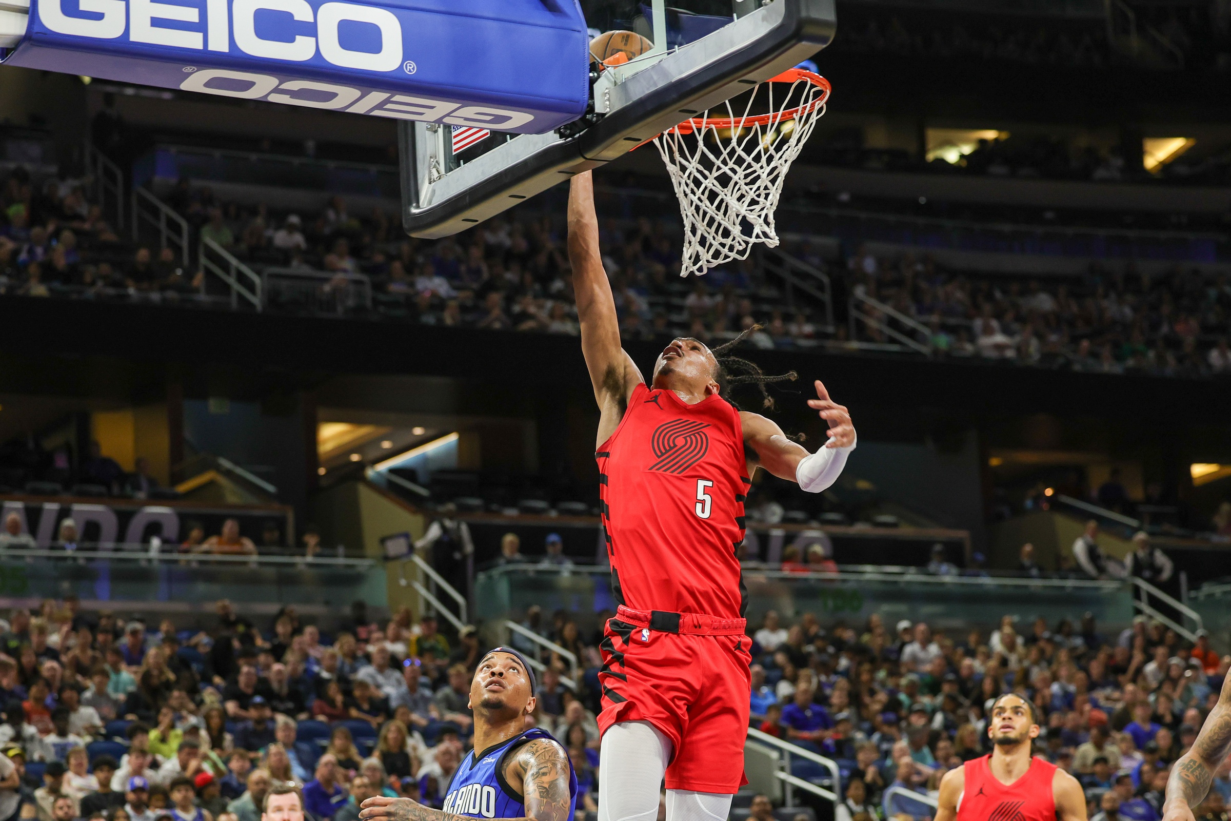 Portland Trail Blazers guard Dalano Banton (5) goes to the basket against Orlando Magic guard Markelle Fultz (20) during the second quarter at Amway Center.