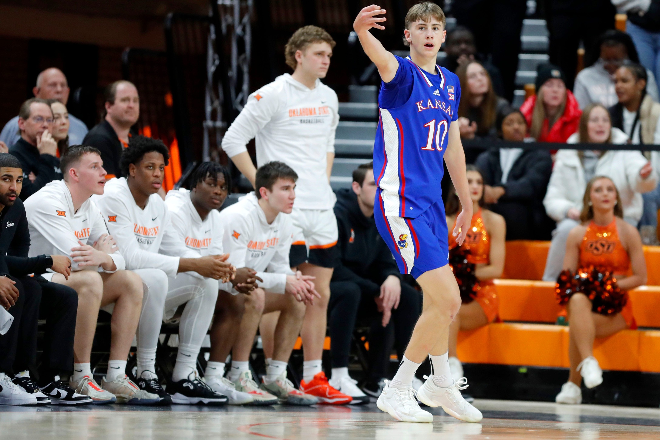 Kansas Jayhawks guard Johnny Furphy (10) celebrates after making a 3-pointer during a college basketball game between the Oklahoma State University Cowboys (OSU) and the Kansas Jayhawks at Gallagher-Iba Arena