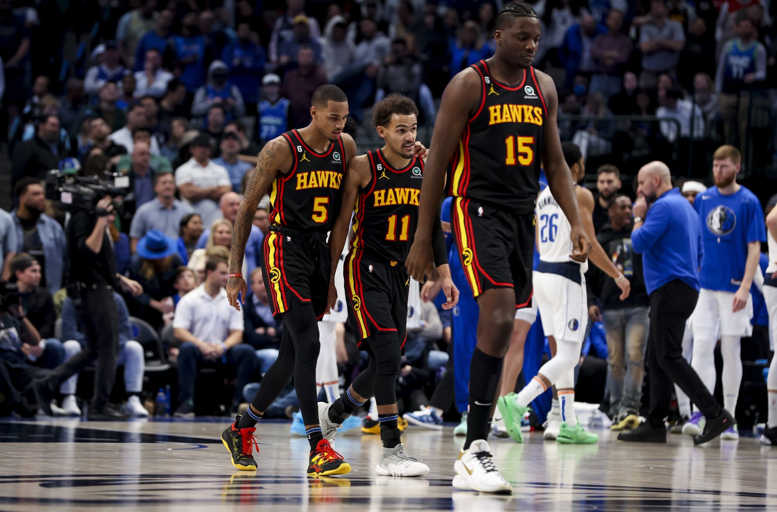 Atlanta Hawks players Trae Young, Dejounte Murray, and Clint Capela