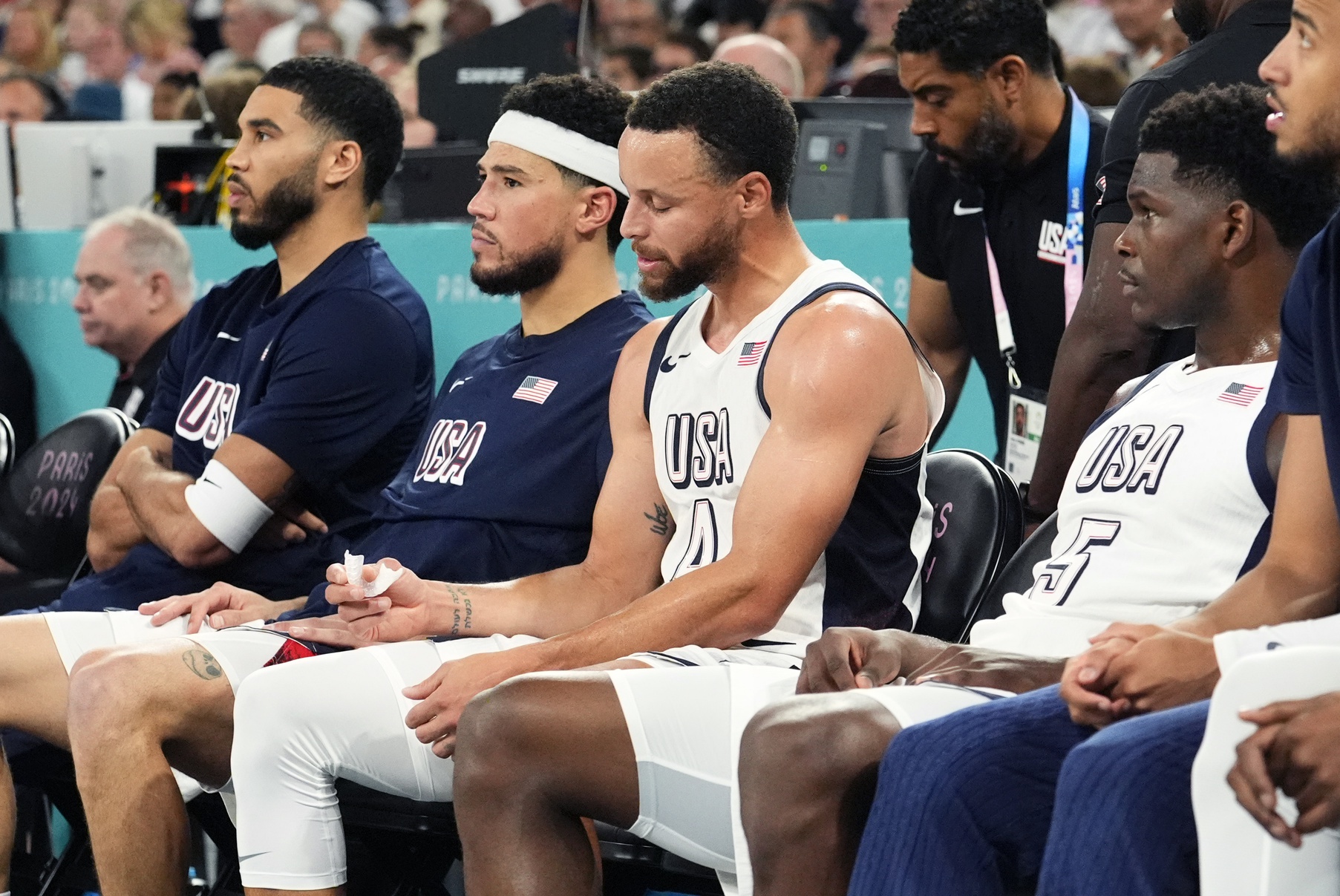 Team USA small forward Jayson Tatum (10), guard Devin Booker (15), shooting guard Stephen Curry (4) and guard Anthony Edwards (5)