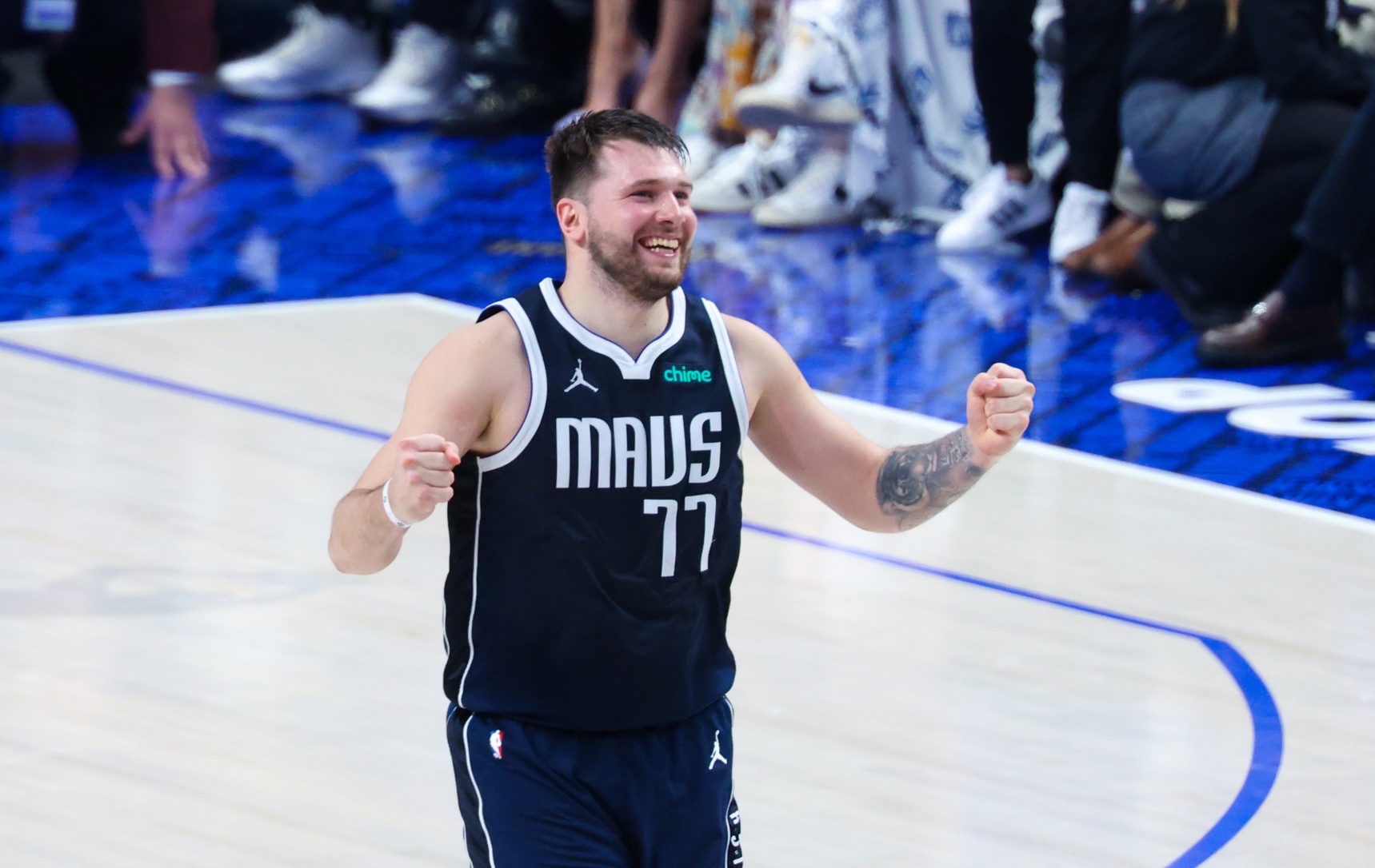 Dallas Mavericks guard Luka Doncic (77) reacts during the game against the Boston Celtics during game four of the 2024 NBA Finals at American Airlines Center.