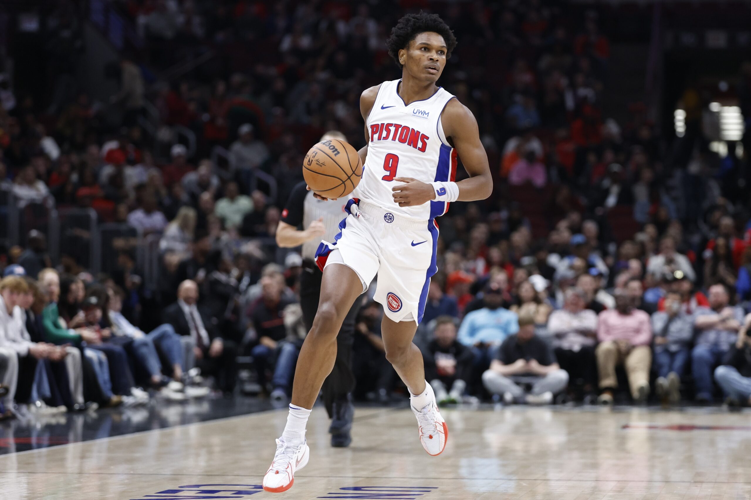 Detroit Pistons forward Ausar Thompson (9) brings the ball up court