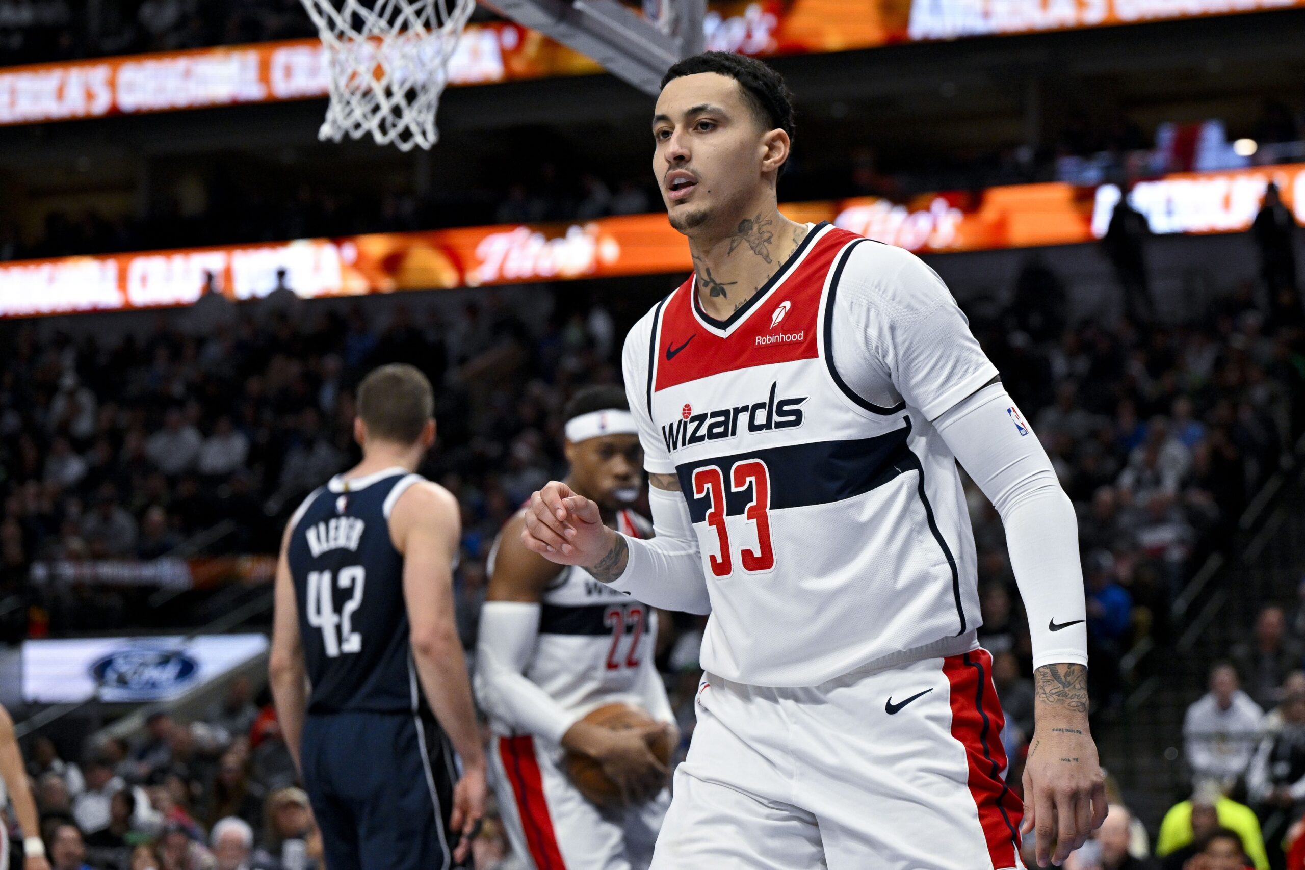 Washington Wizards forward Kyle Kuzma (33) celebrates after he makes a basket against the Dallas Mavericks