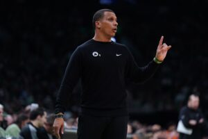 Oct 22, 2024; Boston, Massachusetts, USA; Boston Celtics head coach Joe Mazzulla watches from the sideline as they take on the New York Knicks at TD Garden. Mandatory Credit: David Butler II-Imagn Images Lonnie Walker IV