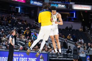 Indiana Pacers forward Enrique Freeman (8) and center Myles Turner (33) celebrate