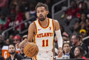 Atlanta Hawks guard Trae Young (11) controls the ball