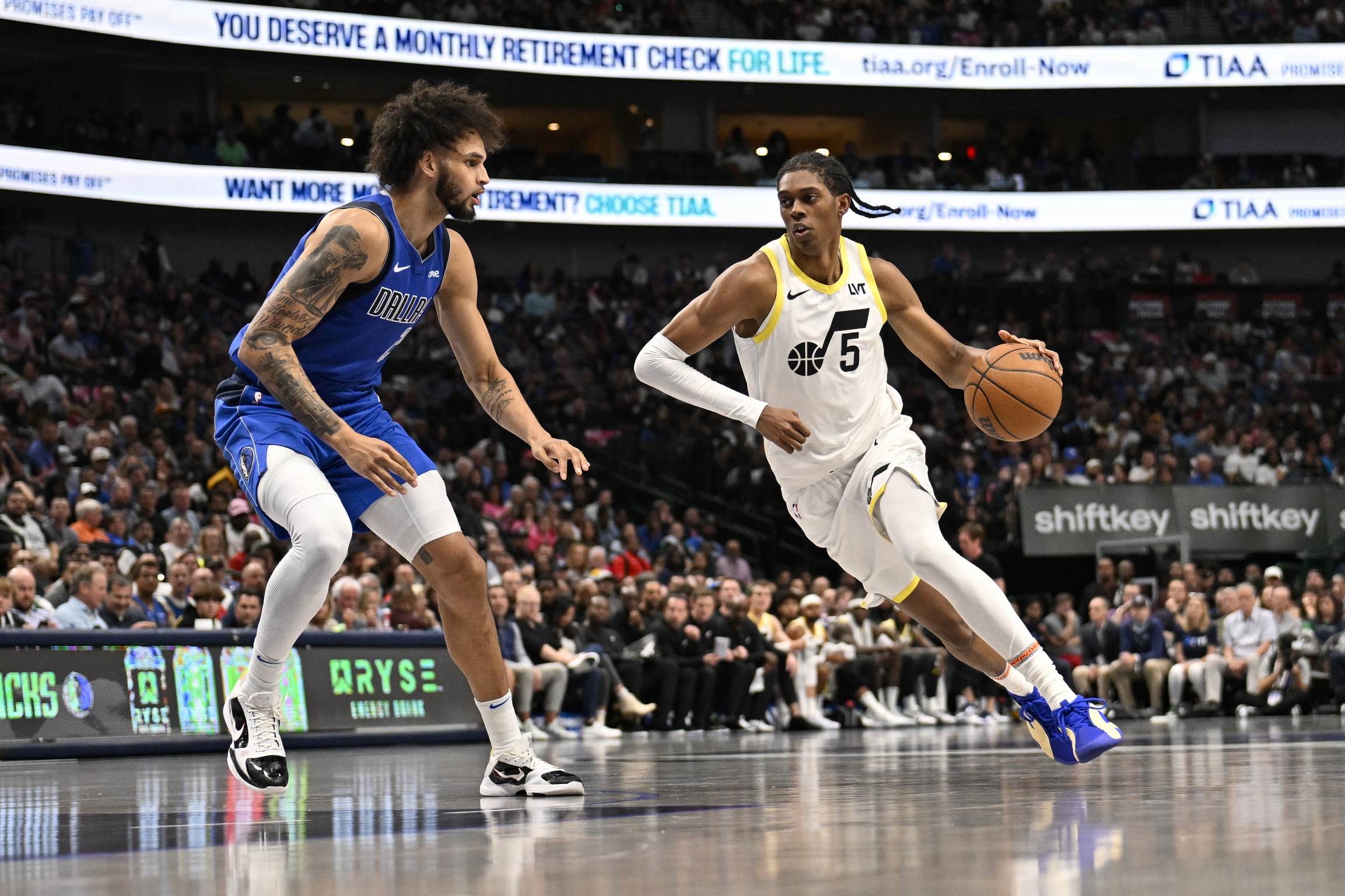 Dallas Mavericks center Dereck Lively II (2) and Utah Jazz forward Cody Williams (5)