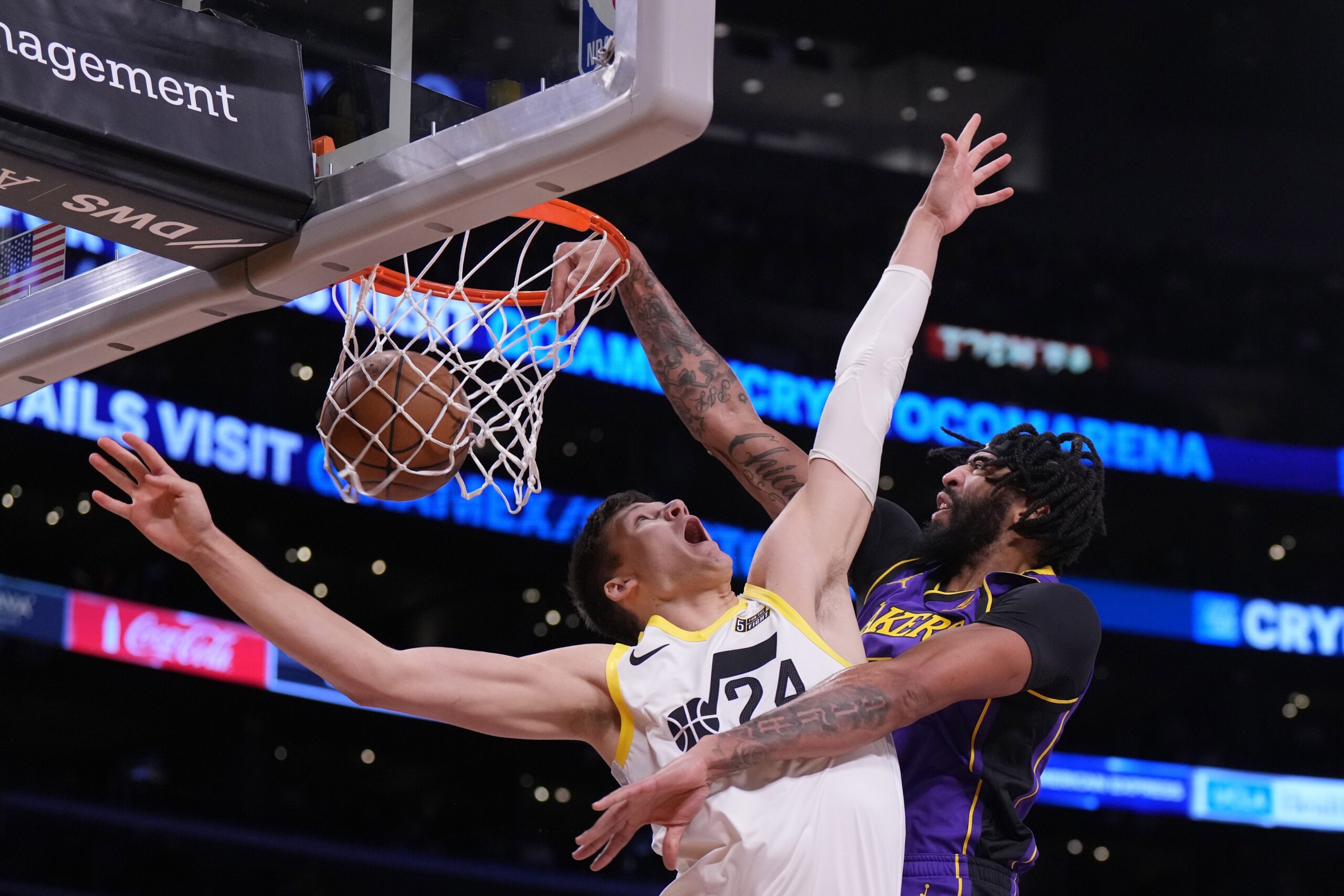 Nov 4, 2022; Los Angeles, California, USA; Los Angeles Lakers forward Anthony Davis (3) dunks the ball against Utah Jazz center Walker Kessler (24) in the first half at Crypto.com Arena. Mandatory Credit: Kirby Lee-USA TODAY Sports