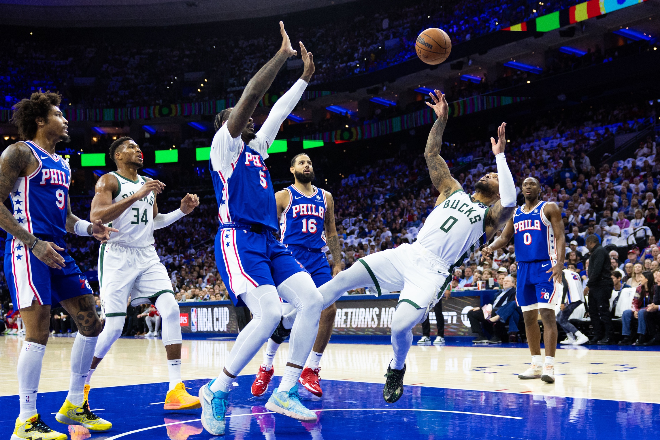 Milwaukee Bucks guard Damian Lillard and Philadelphia 76ers center Andre Drummond