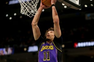 Nov 6, 2024; Memphis, Tennessee, USA; Los Angeles Lakers center Jaxson Hayes (11) dunks during the first half against the Memphis Grizzlies at FedExForum. Mandatory Credit: Petre Thomas-Imagn Images