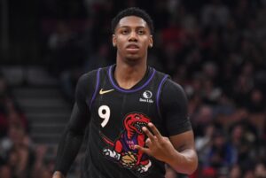 Nov 21, 2024; Toronto, Ontario, CAN; Toronto Raptors forward RJ Barrett (9) reacts after making a three point basket against the Minnesota Timberwolves in the second half at Scotiabank Arena. Mandatory Credit: Dan Hamilton-Imagn Images