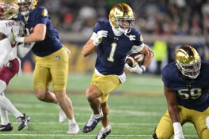 Notre Dame seeks a statement victory to keep its playoff aspirations alive, playing host to the Virginia Cavaliers in South Bend.