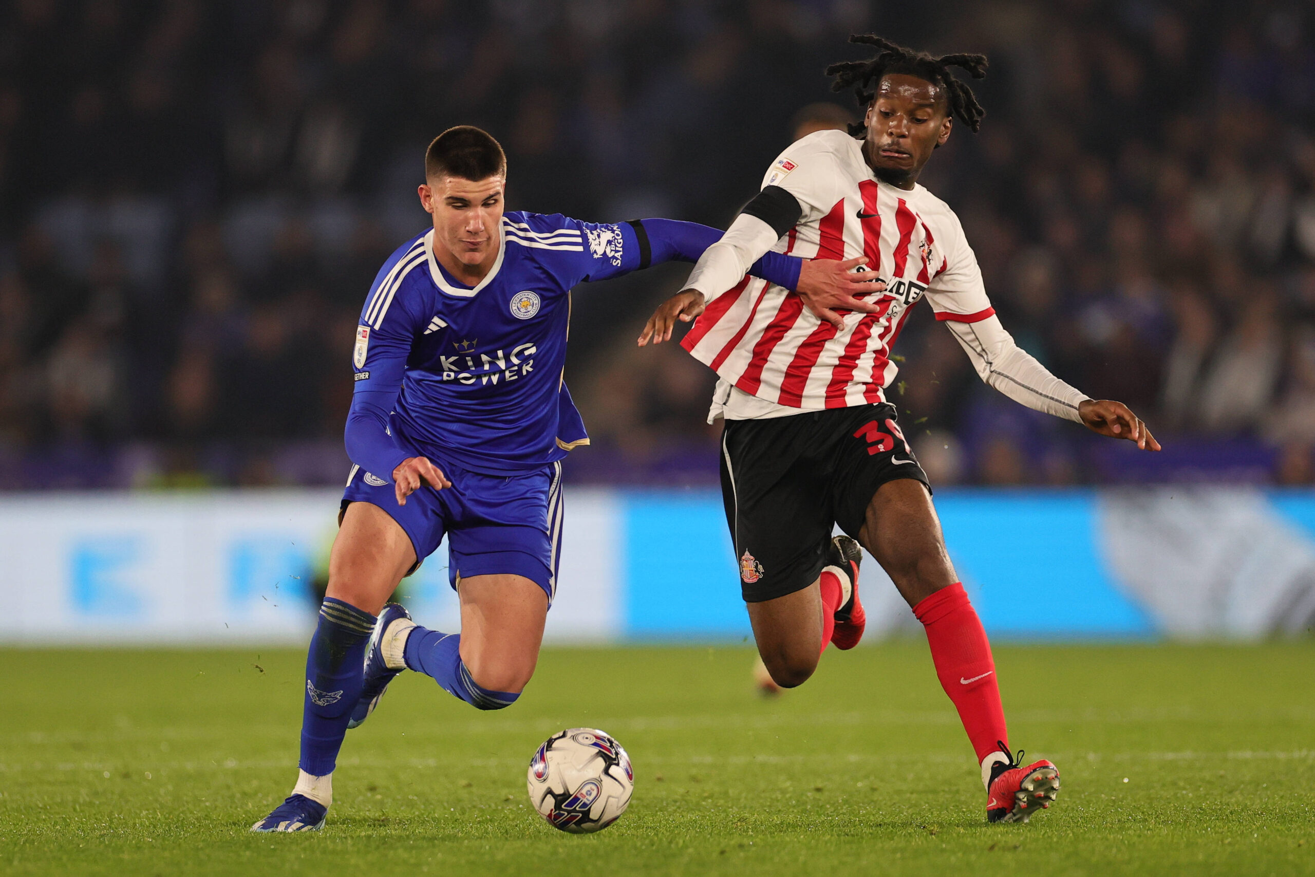 Cesare Casadei and Pierre Ekway compete for the ball