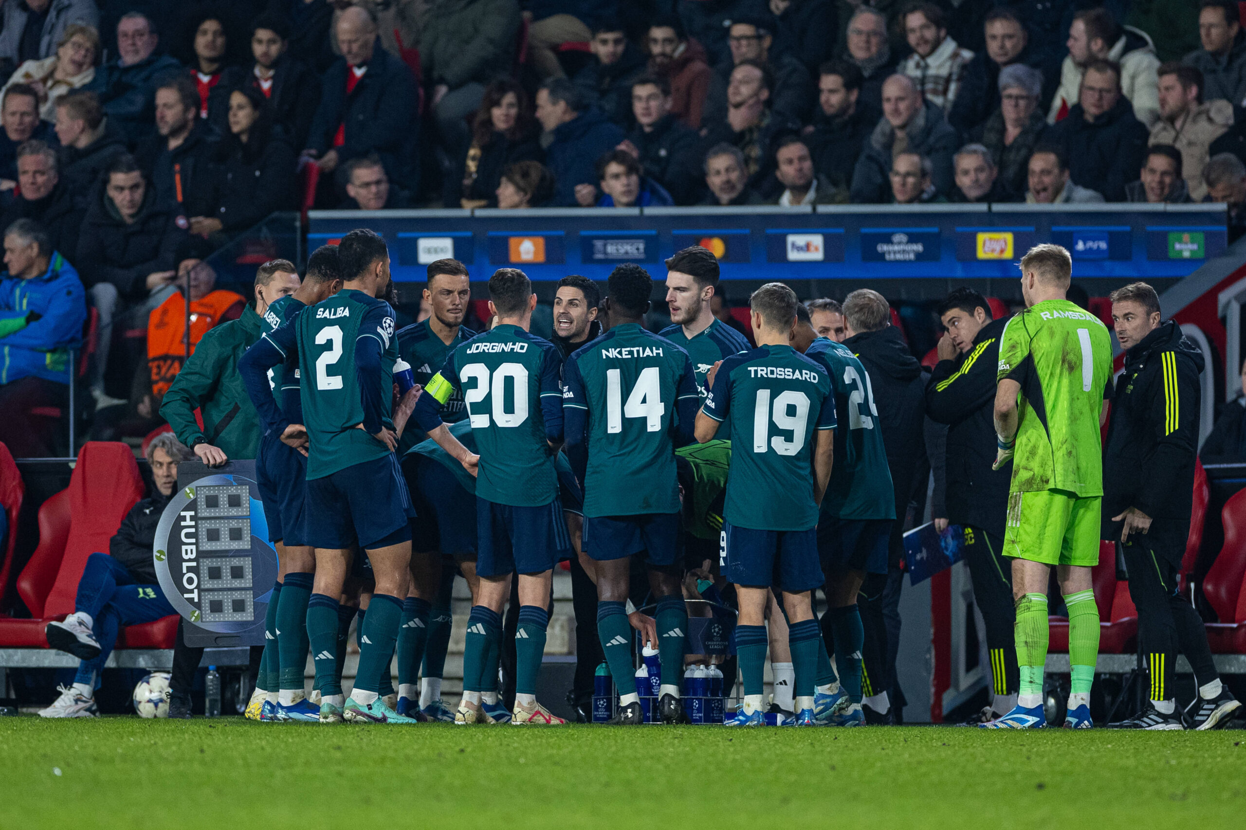 Arsenal players receive instructions from Mikel Arteta