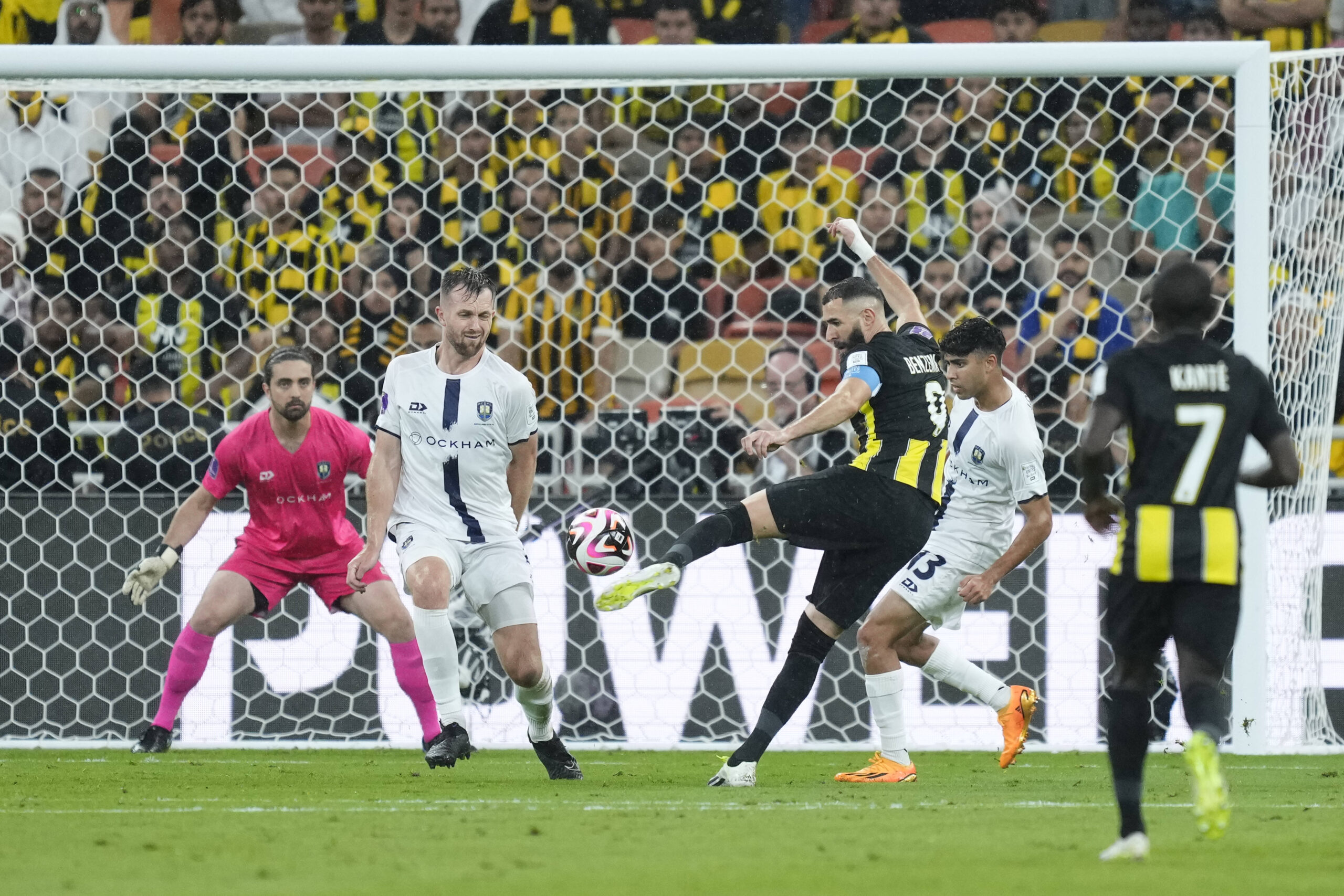 Karim Benzema strikes a volley towards goal