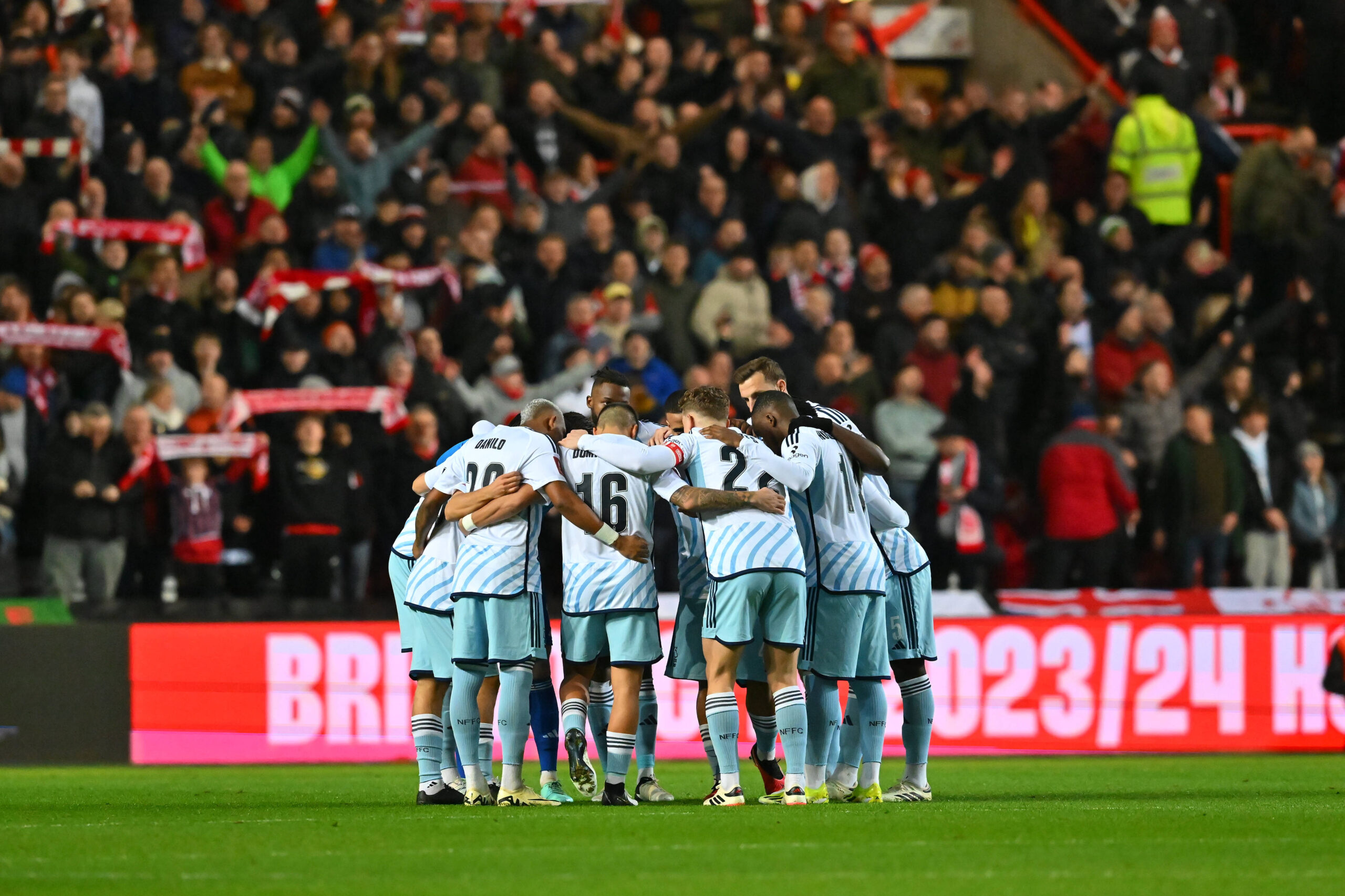 Nottingham Forest players huddle before a match