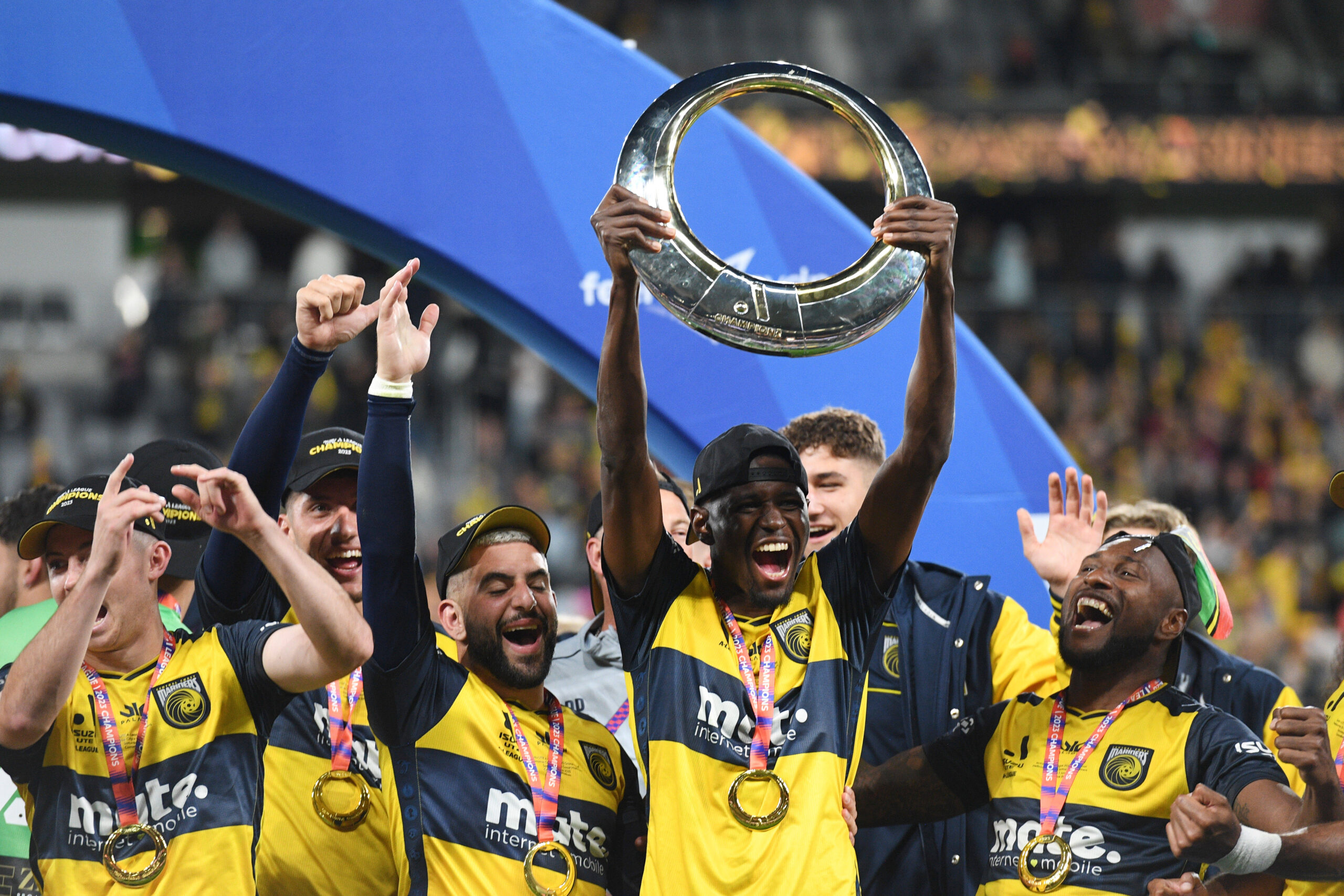 Australian A-League champions celebrate with the trophy