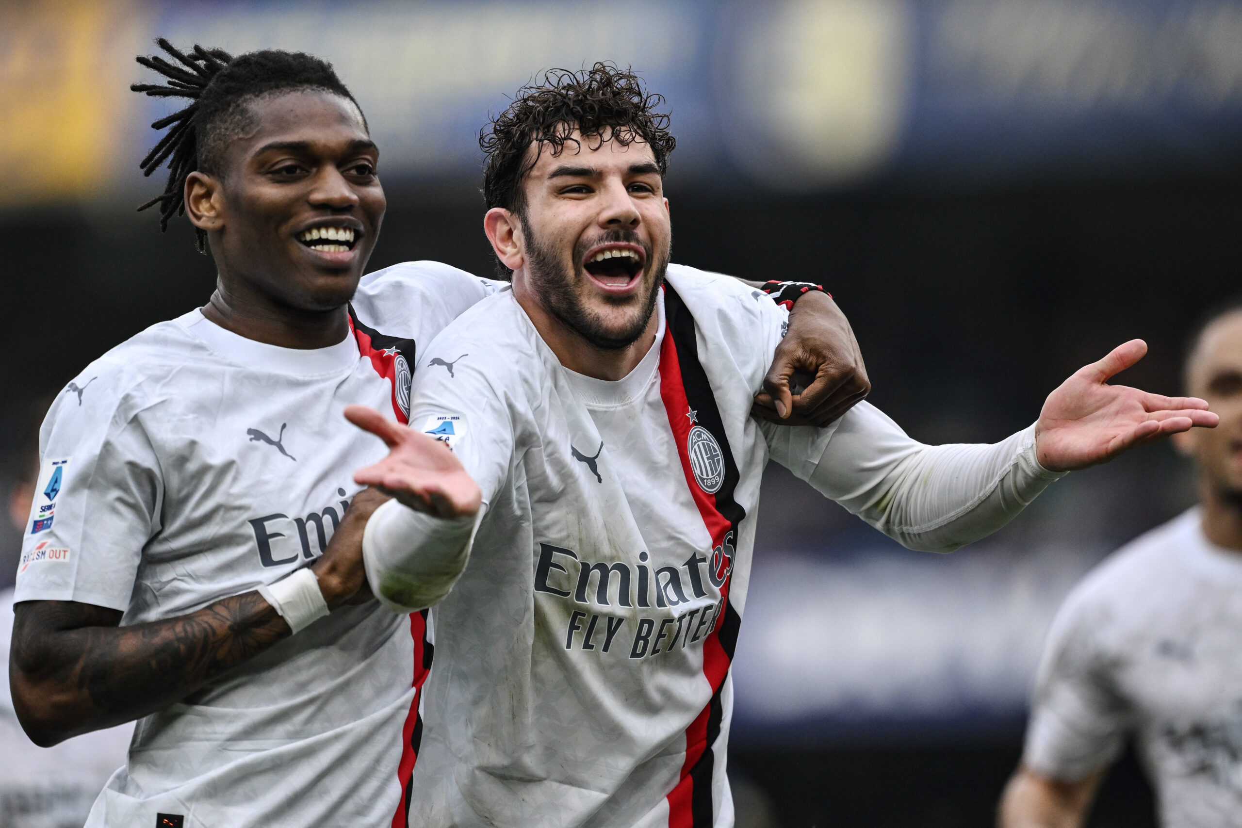 AC Milan's Rafael Leao and Theo Hernandez celebrate a goal against Hellas Verona in Serie A.