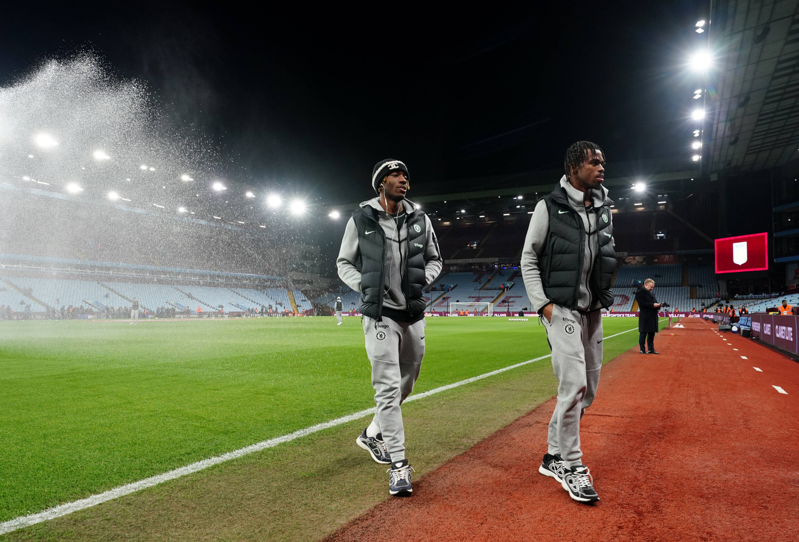 Noni Madueke and Carney Chukwuemeka arrive before a match