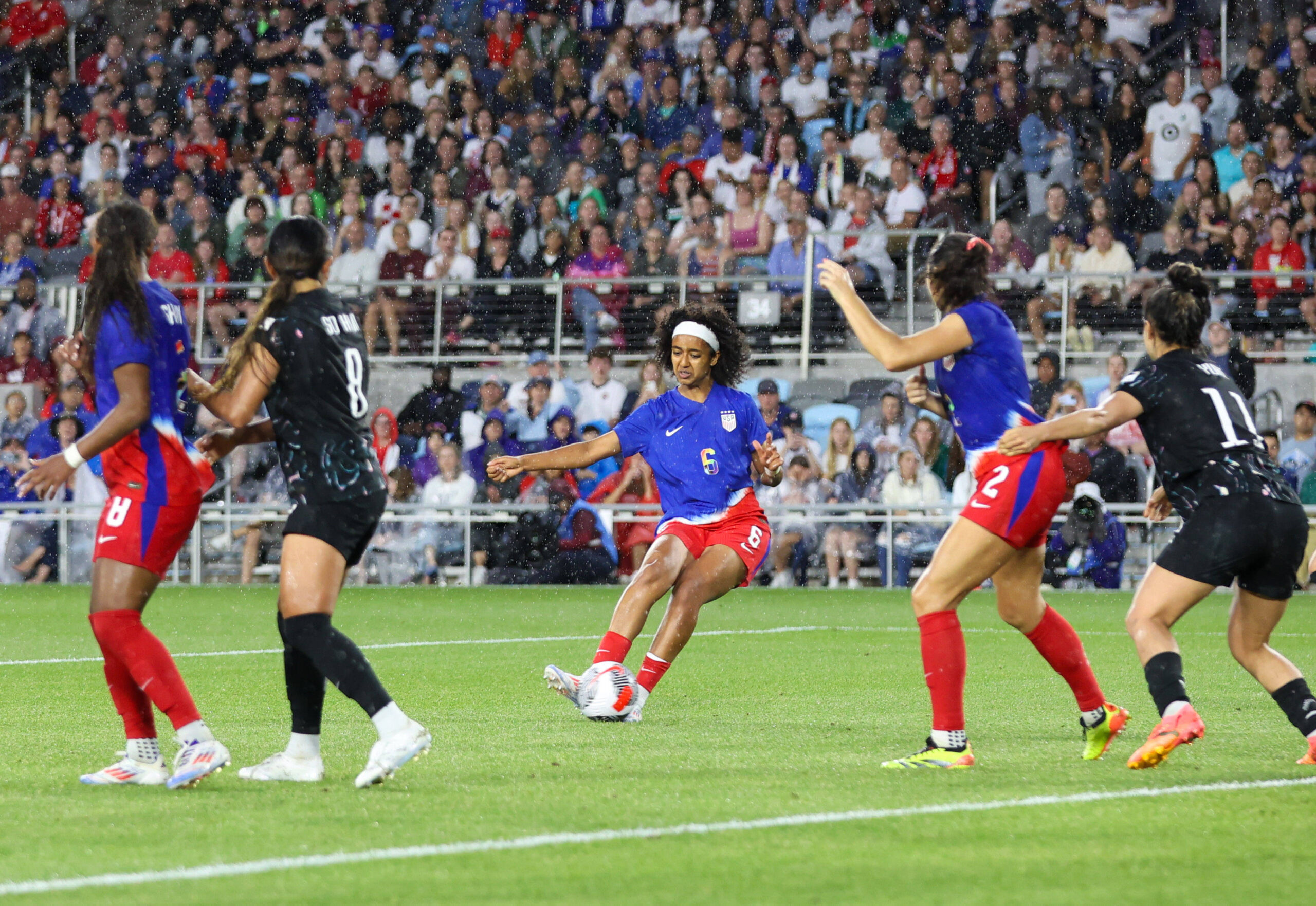 Lily Yohannes strikes the ball toward goal