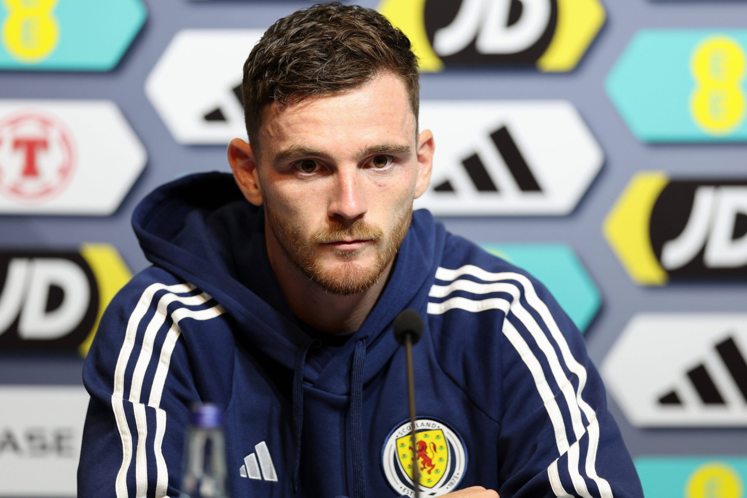 Andy Robertson speaks at a press conference ahead of Scotland tie