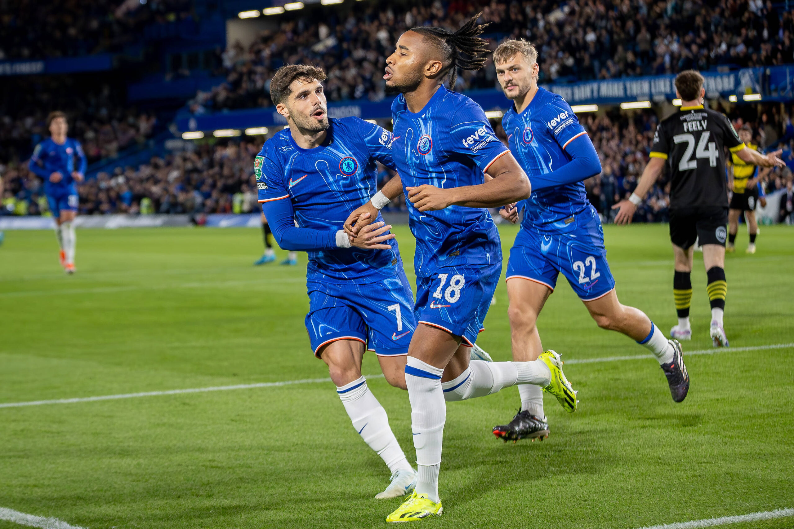 Christopher Nkunku and Chelsea teammates celebrate goal